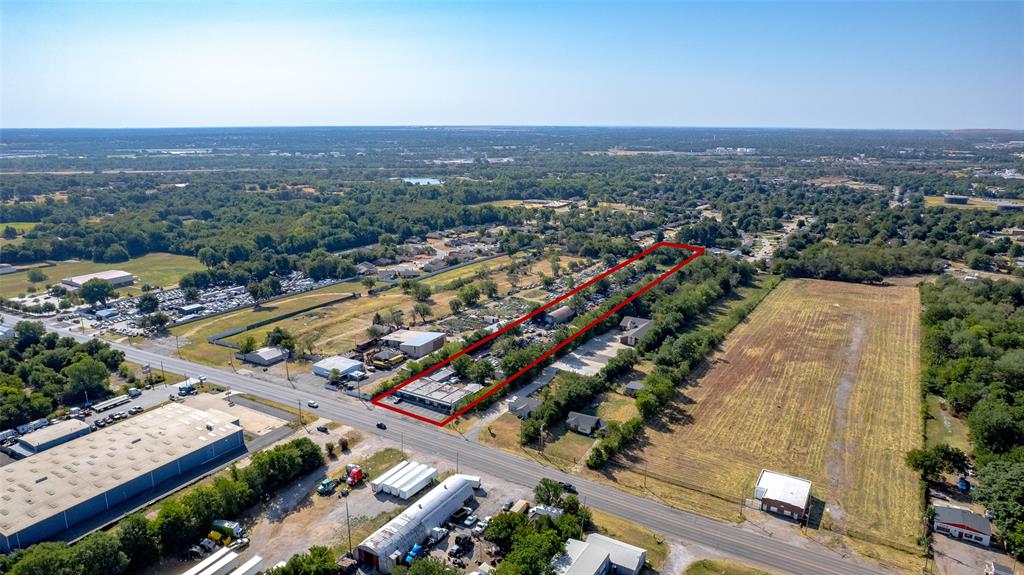 3024 NE 23rd Street is a 3.85-acre multi-tenant commercial property in Oklahoma City with three buildings totaling 9,580 SF: a 5,100 SF neighborhood shopping center, a 3,200 SF back building, and a 1,280 SF warehouse. Zoned I-2 & R-1. The shopping center carries four units, three of which are currently leased, providing in-place income at close. The back building and warehouse offer additional square footage for owner-use, expanded leasing, or storage. The 3.85-acre site extends well beyond the building footprints, with room for yard, additional parking, or outdoor storage. The property fronts NE 23rd Street, which carries roughly 19,887 vehicles per day. Suited to investors seeking a multi-tenant income property or owner-users needing retail, service, and warehouse space on one site.