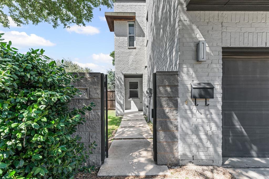 Welcome to 2918 Merrimac Street – a corner-lot gem in Fort Worth’s Cultural District! This beautiful townhome offers unbeatable walkability to the Cultural District, 7th Street restaurants, coffee shops, and entertainment.  Just minutes away from Dickies Arena, Trinity Park trails, and downtown.
A charming iron gate opens to a private front courtyard, leading to the open-concept first floor with engineered wood floors. The stylish kitchen features granite countertops, a center island, and a gas range, flowing seamlessly into the living and dining areas. A convenient guest half bath is also on the main level.
Upstairs, you’ll find three bedrooms, two full bathrooms, a landing area with a built-in desk —perfect for working from home. The spacious primary suite has a luxurious en-suite bath with a soaking tub, separate shower, and a large walk-in closet. The laundry room accommodates a full-size washer and dryer.

The backyard is designed for relaxation and entertaining, featuring a screened-in patio, a backyard, and additional space for grilling. The front-entry garage includes a professionally epoxied floor and a built-in storage cabinet. 

This home offers the perfect blend of style, comfort, and convenience in one of Fort Worth’s most desirable neighborhoods—schedule your showing today!
