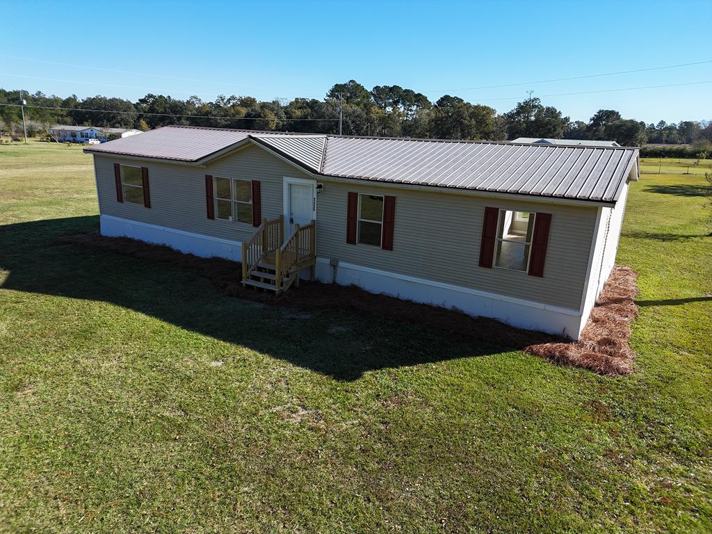 Say hello to your new oasis - a remodeled spacious 3 bedroom, 2 full bath beauty with not one, but TWO cozy living areas and a bonus office space! This stunning property sits on over an acre of land, providing all the space and you could ever dream of.   Whether you're looking for a peaceful retreat from the hustle and bustle of everyday life or a place to grow and create memories with your loved ones, this property has it all. Don't miss out on the opportunity to make this dream home yours - schedule a tour today and get ready to fall in love!