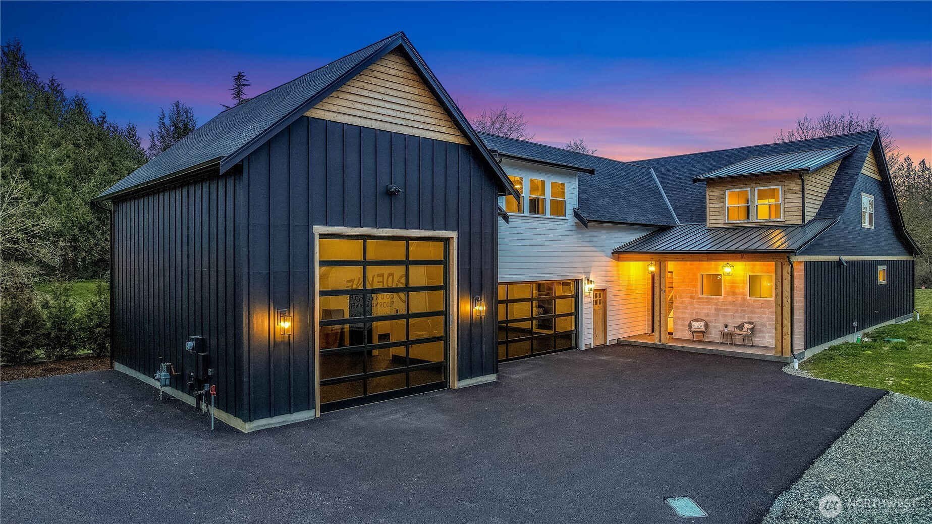 Experience refined smart home living in this exceptional Lynden retreat—nestled among evergreens & in town. Step inside to discover a chef’s dream kitchen true Caliber refrigerator/freezer, triple ovens, double dishwashers & hidden butler’s pantry. Living area boasts a stunning glass-enclosed, UL-certified wine fridge. Main-floor primary suite is pure indulgence with a steam shower & in closet private laundry. Remote operated privacy glass opens to an outdoor kitchen including double grills & spacious yard bordering scenic walking trails. The oversized RV bay offers versatility—perfect for gym, batting cages, or indoor hoops. Thoughtful built green design & quiet surroundings create a one-of-a-kind haven walking distance from down town!