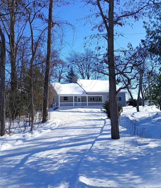 DONT MISS OUT ON THIS NEWLY RENOVATED LAKE HURON WATERFRONT HOME! Beautiful newly renovated almost 2000 sq ft. year around home with a nice sandy beach, spacious open floor plan, cathedral ceiling and main floor living with incredible lake views! 3 bedroom, 2 bath home with a cute and welcoming large covered front porch. A cool loft 4th bedroom upstairs is great for extra sleeping/storage/etc space! Home features a concrete driveway, oversized deep garage with carport, extra storage shed, composite decking, large enclosed Sunroom and a private deck to watch the amazing sunrises over the lake! All new Kitchen Appliances (French Door Refrigerator, Stove, Dishwasher and built-in Microwave). Large Laundry room with lots of built-in storage cabinets and a new Washer and Dryer! This lakefront home was just lovingly renovated and has so many new items to list! Brand New forced air Furnace, New 50 gallon hot water heater, all new flooring, freshly painted interior, all new solid wood 6-panel interior doors, new window blinds throughout, new exterior doors including storm doors on both the home and garage. Stunning new 70 inch electric Stone Fireplace with heat and remote, new faucets, toilets, door and cabinet knobs, all new lighting and ceiling fans and the beautiful new log walls provide such a warm and inviting atmosphere! Sellers are leaving many new lakefront themed items with the home! Too many new upgrades to list here! This amazing home also offers City Water and Natural Gas! High speed internet and Cable are also available! Dont miss out on this rare find in a highly desirable lakefront neighborhood near golf courses and marinas in between the Tawas area and Au Gres! This one wont last long! *Seller is relocating out of the area and need to sell.