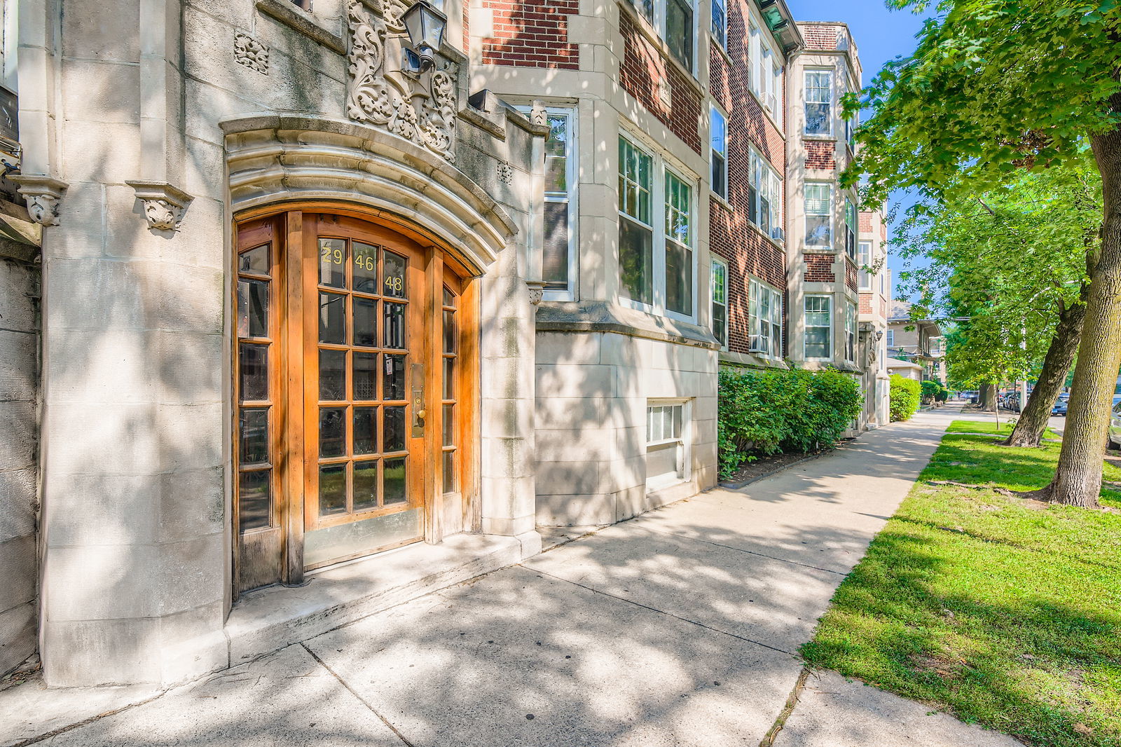 Light filled and full of character, this 3 bedroom 1600 sqft corner condo offers the perfect blend of timeless elegance and modern convenience. A welcoming barrel vaulted foyer opens to a sun drenched living and dining room with views of a picturesque, tree-lined street and perfect for entertaining! The Chef's kitchen features high end stainless steel appliances, granite countertops, center island and custom cabinetry with abundant storage. The split floor plan offers two spacious bedrooms on one side and a private third bedroom, ideal for guests, a home office, etc. The spa like bathrooms feature natural stone and designer fixtures. Additional features include hardwood floors throughout, new windows with tinted privacy glass, a modern electric fireplace, crown molding and custom window coverings. Located in Nettelhorst School District, the lake, Lincoln Park, shops, grocers, restaurants and transportation are all right outside your front door. Many parking options are available nearby, including permit street parking. Check SpotHero for garage options.