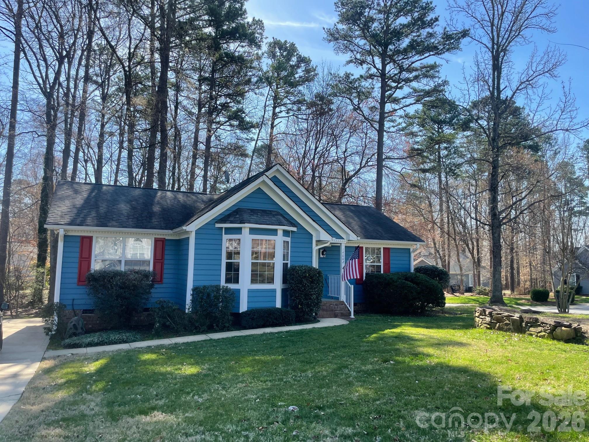 Welcome to 14002 Naworth Lane, a well-maintained bungalow nestled in one of Huntersville’s most desirable communities, a hard-to-find neighborhood with no HOA. This inviting property blends comfort, style, and convenience, offering a bright open layout ideal for both everyday living and entertaining. Thoughtful updates include fresh interior paint, new water heater, dishwasher, washer and dryer, updated primary bath, recent exterior paint. Generous natural light, and well-appointed living spaces with soaring ceilings create a warm atmosphere. Upon entering the home, you will find a spacious main living area that flows seamlessly into a large eat-in kitchen, perfect for gatherings. This ranch is a rare split-bedroom floor plan with well-sized bedrooms that provide privacy and comfort, including a serene primary suite with large walk-in closet. Outdoors, enjoy a backyard retreat—a large corner lot with gorgeous mature trees and landscaping. This serene setting is ideal for morning coffee, weekend grilling, or unwinding after a long day. Some of the area's most popular hot spots are just a short bike ride or walk away - Harvey's Bar & Grill, Coffee Republic, Mama Mia's, Crafty Beer Guys. Enjoy shopping, dining, parks, and top Huntersville amenities within just a few minutes' drive. This lovely home offers the perfect balance of neighborhood charm and everyday convenience. A wonderful opportunity to own a beautifully cared-for home in a highly sought-after location.