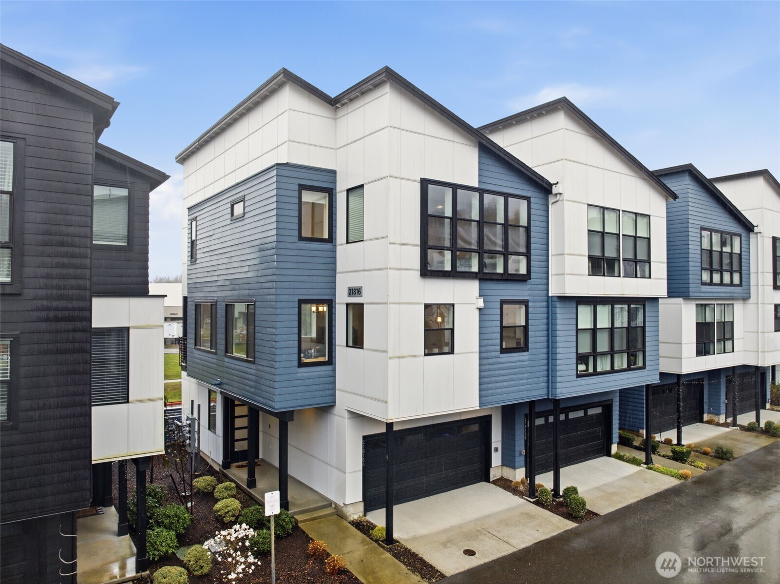 Set in the desirable 220 Towns at Canyon Park, this upgraded end-unit townhome offers stylish living in a prime Bothell location. Surrounded by a welcoming boulevard streetscape and just steps from the neighborhood park, the home combines a tranquil atmosphere with quick commuter access. Crafted by Toll Brothers, this coveted floor plan offers 4 bedrooms, 3.5 baths, and an airy open-concept design filled with natural light from oversized windows. Elegant 9-foot ceilings, a sunlit great room with fireplace, and seamless flow into the gourmet kitchen and dining area create a home that lives beautifully. The upper level features a massive Primary Suite with a walk in closet and spa like bathroom. A covered balcony extends the main living space outdoors, while the lower level provides a private guest suite and direct access to the 2-car garage. The fenced yard offers a comfortable outdoor retreat with room for pets or planting. All within the Northshore School District, this home pairs thoughtful design with an exceptional community setting.