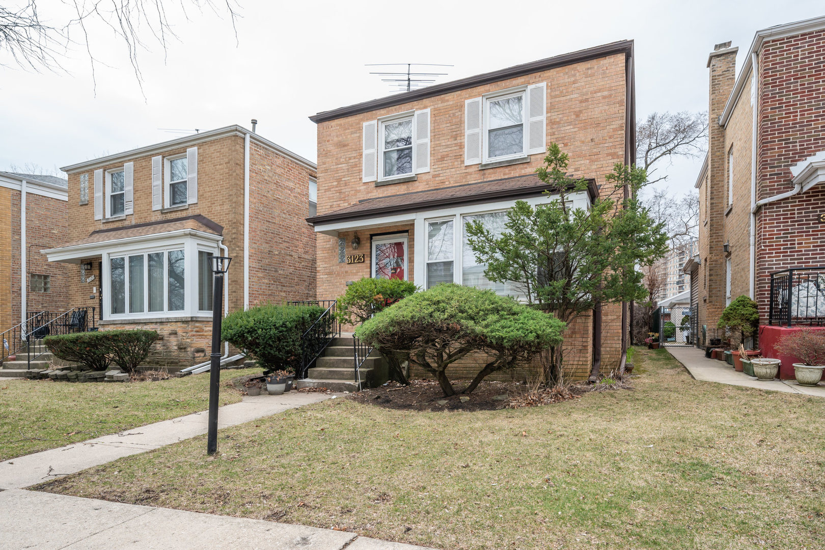 Beautifully maintained West Rogers Park home with spacious brick addition offering 5 bedrooms and 4.5 baths. The second floor features 5 bedrooms, including a primary suite with walk-in closet and full bath, plus ample closet space throughout. Main level highlights include hardwood floors, formal dining room, powder room, large family room, and a bright kitchen with generous cabinet and counter space, high-end appliances, and eat-in area. Two separate basements provide versatile options with a recreation room, extra bedroom, office/guest space, and abundant storage. Mechanical updates include dual HVAC systems, 200-AMP electrical, sump pump, water heater pump, and alarm system. Step outside to a low-maintenance, cemented backyard-perfect for grilling, gatherings, or simply relaxing. With its generous space, thoughtful updates, and prime West Rogers Park location, this home offers comfort, functionality, and room to grow.