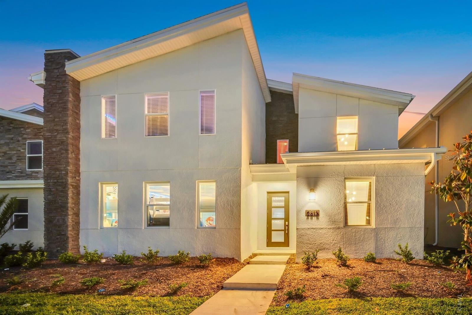 Welcome to 2812 Simile St, a beautifully finished 9 bedroom, 5 bathroom retreat in one of Central Florida’s most desirable resort communities. This fully furnished home with high end finishes offers an impressive combination of space, comfort, and style that works perfectly as a family vacation escape or as a strong income producing short term rental.Set on a premium conservation lot, the property enjoys peaceful views and true privacy with no rear neighbors. Start your day with coffee on the covered lanai while you look out at the natural surroundings, a rare and coveted setting within Storey Lake.Inside, the spacious layout is designed for both fun and relaxation. The converted garage adds an exciting game and play room that guests of every age will love. Multiple living and gathering areas provide room for everyone to spread out, while the themed bedrooms create a memorable experience for visitors. The modern kitchen features sleek finishes, a large island, and plenty of seating, ideal for hosting family, friends, or vacation guests.Storey Lake offers incredible resort style amenities including a lazy river, water slides, fitness center, clubhouse, and more, all just minutes from Disney, world class shopping, and dining. If you are looking for a vacation home that checks every box or a ready to go investment property with outstanding appeal, 2812 Simile St delivers the location, lifestyle, and income potential you want.