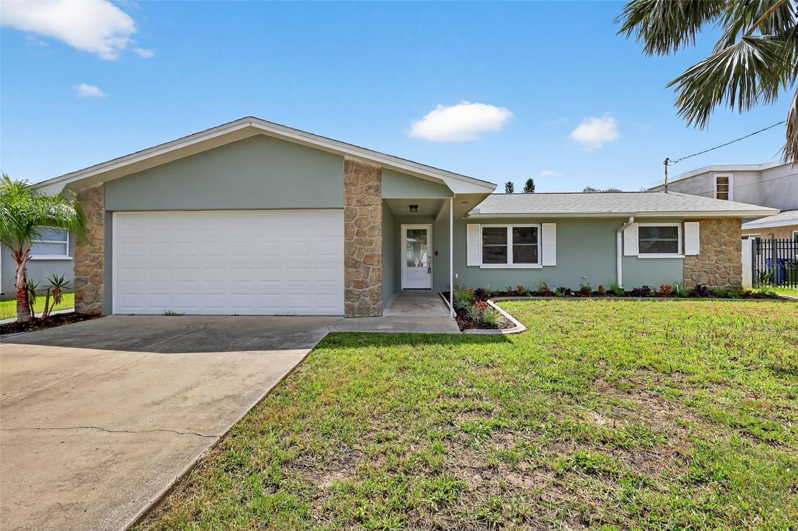 Exceptional Dunedin Gem — Fully Remodeled & Move-In Ready!Beautifully updated 3-bedroom, 2-bath home offering the perfect blend of modern comfort and the sought-after Dunedin lifestyle. Ideally located near vibrant Downtown Dunedin, the Pinellas Trail, Hammock Park, and the beautiful beaches of Honeymoon Island, with biking, dining, breweries, parks, and waterfront sunsets all just minutes away.Inside, the home has been extensively renovated with fresh paint, luxury vinyl flooring, updated drywall, upgraded kitchen receptacles, new stainless-steel appliances, stylish stone countertops, and a bright, open feel throughout. The desirable split-bedroom floor plan offers privacy, while the spacious primary suite features a walk-in closet and plenty of room to unwind.The open kitchen flows into the living areas and Florida room, creating an inviting space for everyday living and entertaining. Step outside to a newly fenced backyard with a spacious wood deck, plenty of room for gatherings, pets, gardening, or even a future pool. The sprinkler system is already in place and working great.Whether you’re biking the Pinellas Trail into Downtown Dunedin, spending the afternoon at nearby Hammock Park, or heading out to Honeymoon Island for the beach, this location puts some of Dunedin’s best attractions within easy reach.Beautifully renovated, move-in ready, and located in one of Pinellas County’s most desirable communities—this is the Dunedin home you’ve been waiting for.