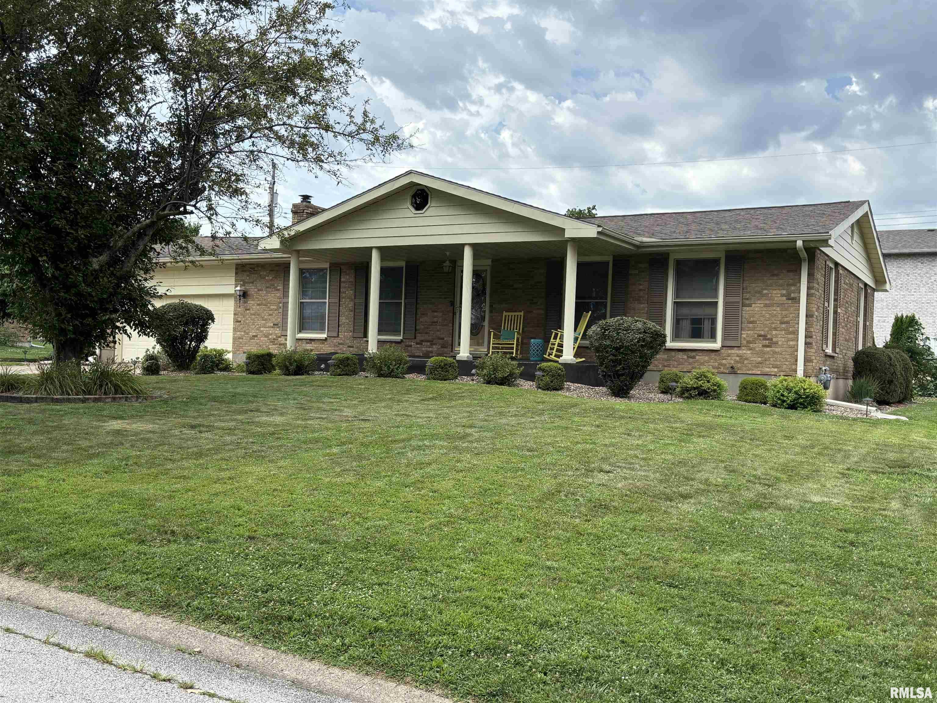 **Brick Ranch on a Cul-de-Sac with 2½ Baths & Finished Basement!** This inviting 3-bedroom brick ranch offers flexible living space with a potential 4th bedroom in the basement (no egress window). Enjoy a cozy gas insert fireplace, open kitchen-dining area, and a finished basement with a second kitchen—perfect for entertaining or extended family. Relax on the large front porch or covered patio overlooking the fenced backyard. 2-car attached garage with extra storage room, plus a shed that conveys. Many updates, sump pump with battery backup, and a quiet cul-de-sac location complete this great home. **A must-see for buyers looking for space, versatility, and comfort!**  Basement Refrigerator, freezer, range/oven and microwave also convey.  Roof is approximately 4 years old.