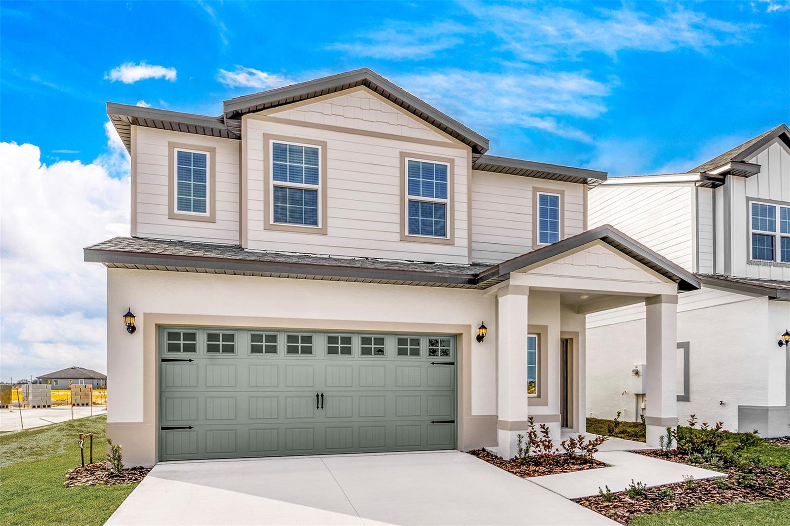 Welcome to the Mangrove floor plan, a beautifully designed two-story home offering style, space, and functionality in the picturesque Gum Lake Preserve community. With modern finishes, an open layout, and peaceful surroundings, this home provides the perfect blend of comfort and convenience for today’s lifestyle.As you enter through the extended covered front porch, you’re welcomed by a large foyer that leads into a bright and open living area. A convenient half bathroom is located near the entrance for guests. The spacious kitchen is the heart of the home, featuring granite countertops, a sprawling island with a breakfast bar, modern white cabinetry, and a generously sized walk-in pantry—perfect for meal prep and storage. The sliding glass door in the family room opens to the back lanai, seamlessly connecting indoor and outdoor living spaces.Upstairs, a versatile loft provides extra space for a media room, office, or play area. The private master retreat offers the ideal escape at the end of the day, with enough room for a king-size bed, dresser, and even a cozy seating nook. The en-suite bath includes modern finishes, a dual-sink vanity, a spacious walk-in shower, and a large walk-in closet to keep everything organized. The laundry room is conveniently located upstairs, close to the bedrooms for added ease.Living in Gum Lake Preserve means enjoying all the perks of a beautiful lakeside community. Residents have access to a community boat ramp leading to Gum Lake, a future fishing dock, peaceful walking trails, picnic spots by the pond, and a playground for families to enjoy. Located just minutes from I-4, commuting to Tampa or Orlando is effortless, while the tranquil surroundings of Gum Lake offer a welcome retreat from the city.Don’t miss your chance to make the Mangrove your home—schedule your private tour today and experience lakeside living at its finest!