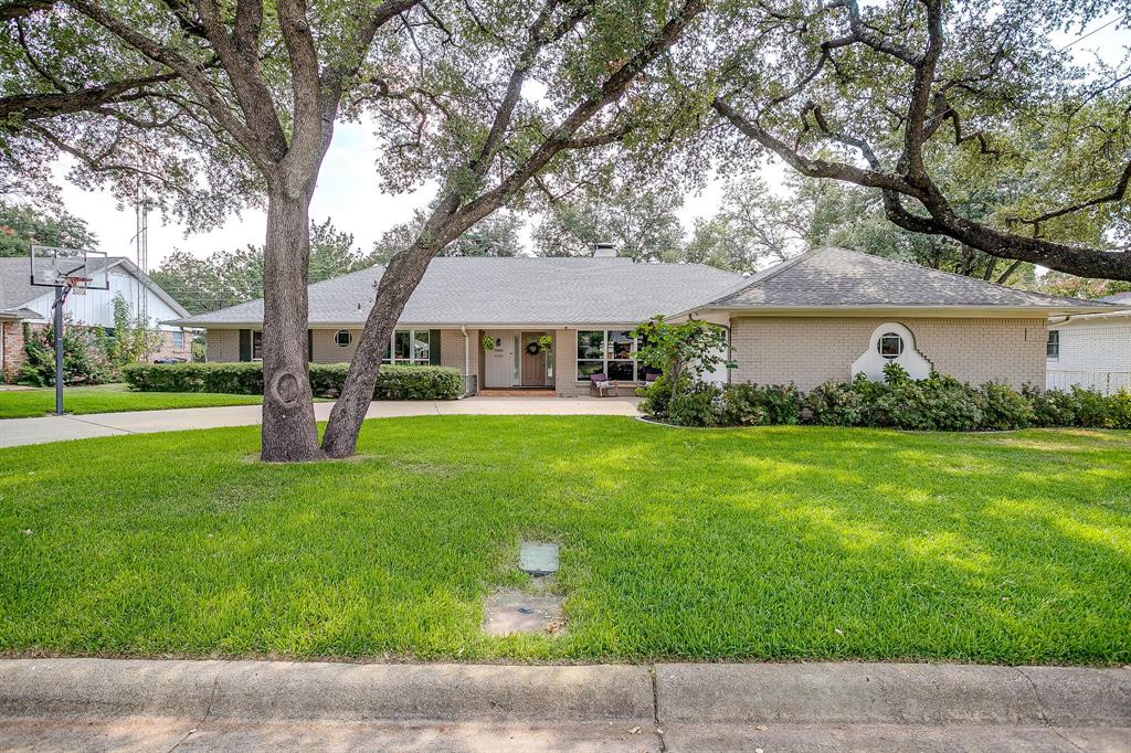 Right when you walk into the home you notice the new flooring throughout, new windows, doors and how incredibly well maintained it is. The home has 3 oversized bedrooms and 2 and a half baths that have been updated as well.  My favorite addition to the home is the back patio area that was added in 2020, perfect for entertaining and all ready to go for football season with built in surround sound, and TV mount in place.  The storage in the home is incredible and rare for this age of home and neighborhood. Multiple living spaces are available if you are needing an office, additional living or game room.  Situated in Overton Park Elementary school district and close to parks, the toll road, and abundant shopping.