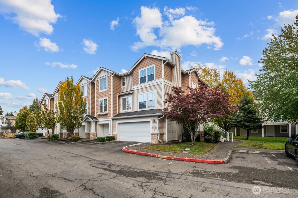 Beautiful corner-unit townhouse in sought-after Bayview at The Lakes! This light-filled home features 9 foot ceilings throughout, a spacious living room equipped with gas fireplace, a bright kitchen with granite counters and tile backsplash, open dining area, and a expansive balcony. The primary suite offers a walk-in closet and dual-sink bathroom. Two well appointed guest bedrooms. The two-car garage boasts epoxy floors, a utility sink, and bonus room with patio access for additional storage or whatever your imagination brings! Conveniently located near highways, light rail, parks, and shopping— don’t miss this incredible home!