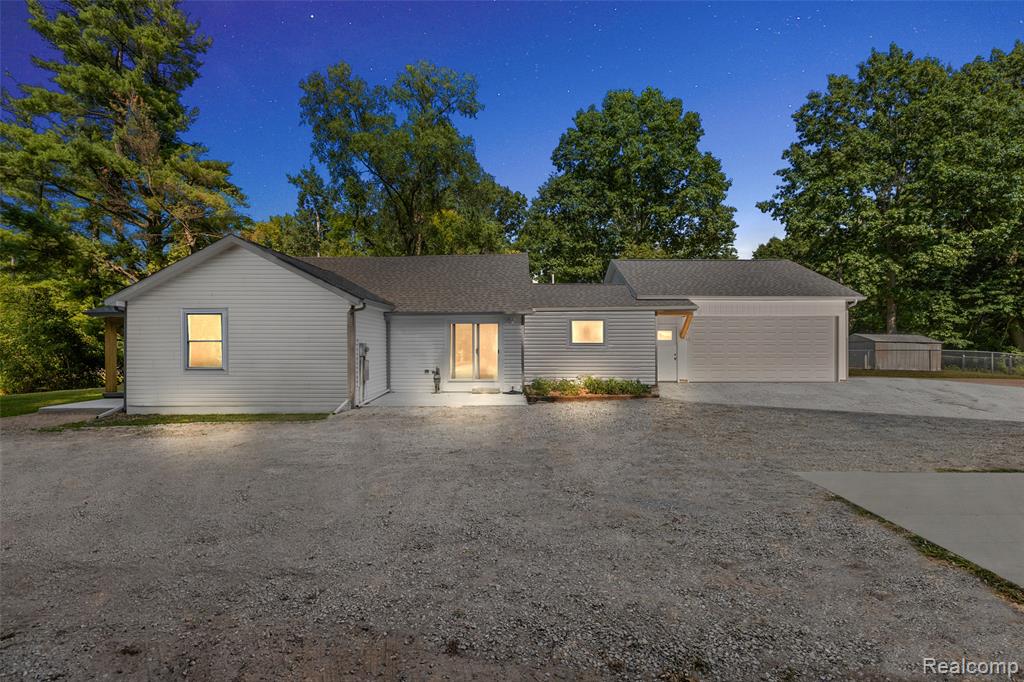 Rarely Available – Fully Renovated Bungalow on 10 Acres in St. Clair Discover a perfect blend of modern luxury and country tranquility at 5771 Gratiot. Set on 10 wooded acres, this 4-bed, 2-bath home offers 1,600+ sq ft of open-concept living, completely renovated in 2025. A charming covered front porch welcomes you inside to rich hickory hardwood floors, LED lighting, and a spacious living room flowing into the dining area with outdoor access. The chef’s kitchen boasts quartz countertops, full-height tile backsplash, modern cabinetry, and gas/electric hookups. The massive primary suite features a walk-in closet and spa-inspired bath with an oversized shower. Three additional large bedrooms share a stylish full bath with a tub/shower combo. The huge laundry room is ready for gas or electric appliances. Upstairs, a versatile bonus room awaits—perfect for an extra bedroom, lounge, or storage. Enjoy a newly built 2½-car attached garage plus a 52x20 pole barn with 15’ ceilings, 220 electric, LED lighting, and five insulated overhead doors. The fenced backyard includes a dog house and storage shed—ideal for pets and play. Every detail is new: garage, roof, windows, AC, furnace, plumbing, electrical, hot water tank, septic tank & field, kitchen, baths, doors, and flooring. A fruit cellar (Michigan basement) adds character and storage. This turn-key retreat offers unmatched privacy while being minutes from town—ready for your next chapter.