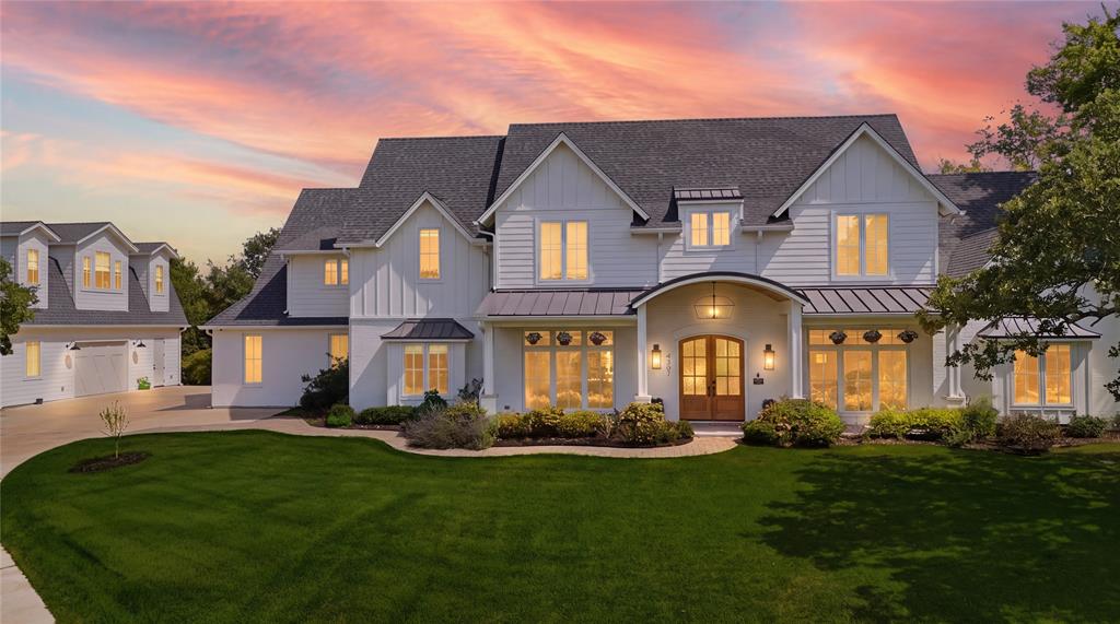 NEW LISTING! A Private Gated Drive Leads to This Stunning Hilltop Resort-Style Estate on 3 Acres. Thoughtfully crafted with superior construction and design, the home features a state-of-the-art foundation, full spray foam insulation, and advanced smart home integration throughout. Inside, you’ll find expansive living spaces complemented by high-end finishes, including GE Café appliances, a built-in plumbed coffee system, nugget ice maker, dual laundry rooms, and a private guest ensuite. The primary suite offers a true spa experience with a steam shower, integrated audio, and seamless smart controls.Technology and convenience are at the forefront, with app-controlled systems for lighting, security, climate (including LG mini-split HVAC), shades, media, and even the irrigation system that maintains the lush Zoysia lawn.Beyond the main residence, the property continues to impress with an oversized three-car garage and a detached 1,200-square-foot shop complete with an upstairs retreat, ideal for a man cave, studio, or flex space.The outdoor experience rivals a private resort. Enjoy a fully lit 30x30 basketball court, putting green, and an incredible pool oasis featuring a water element, spa, cedar cabana, and swim-up bar. Entertain effortlessly with a fully equipped outdoor kitchen, granite countertops, grill station, mini refrigerator, TV connections, integrated speakers, fireplace, and a motorized screened-in patio for year-round enjoyment.A firepit and serene, heavily wooded acreage with a private creek and walking trail complete the setting offering both recreation and tranquility in one remarkable property.