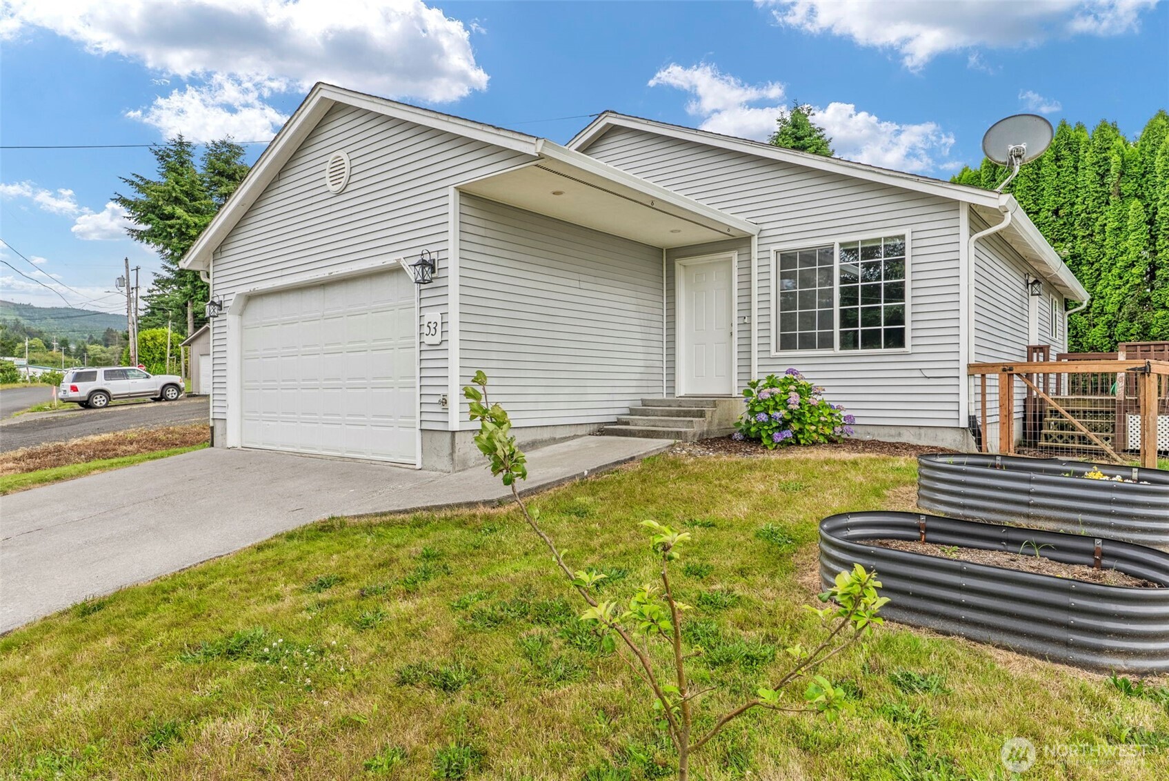 Welcome home to this beautifully maintained, single-level 3-bedroom home that perfectly blends small-town Cathlamet charm with modern updates. From the moment you step inside, the pride of ownership is obvious. The open-concept main living area features brand-new carpet in the living room and a bright kitchen complete with granite countertops, a tile backsplash, and stainless steel appliances. Outdoor entertaining is easy with a side door opening right onto the deck—perfect for summer barbecues. Just off the deck, you'll love the newly added, fully fenced backyard, which offers great privacy and space for pets or gardening. The granite and tile finishes are carried through to both full bathrooms, keeping the look cohesive and clean. Location-wise, you couldn't ask for more: it's a short stroll to the local school and everything downtown Cathlamet has to offer, including the marina, brewery, parks, trails, and galleries. Completely remodeled in 2019 and thoughtfully updated since, this home is move-in ready and waiting for its next owner. Assumable loan option as well!