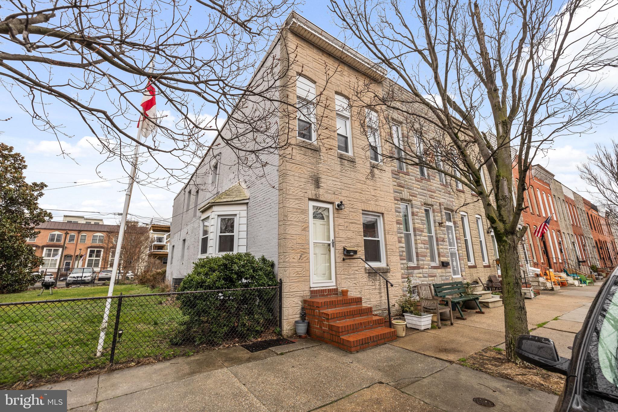 Turnkey 3 bedroom, 1.5 bath home in the heart of Locust Point with the rare bonus of 2 car parking. The spacious main level features a large living room with hardwood floors, recessed lighting, and abundant natural light. The first floor also includes a convenient half bath, a separate dining room, and a functional kitchen. Upstairs offers two generously sized bedrooms, plus a third smaller room that works perfectly as a bedroom or home office, along with a centrally located full hall bathroom. The unfinished basement provides ample storage space and includes a laundry area. There is a private fenced yard out back. The home also comes with two dedicated parking spots in the adjacent church parking lot. The property is currently tenant-occupied. All showings require prior-day notice.  No smokers.  Pets accepted on a case-by-case basis.