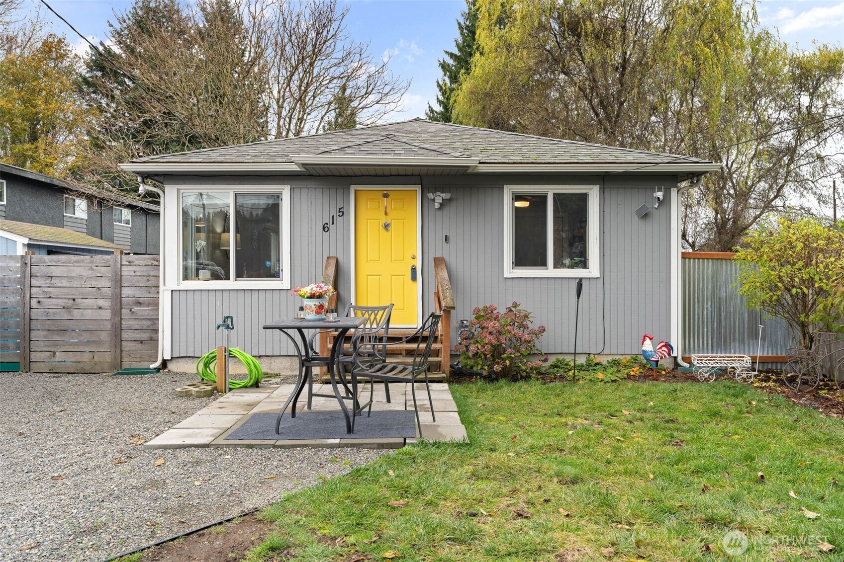 Welcome home to a vibrant, freshly updated rambler that instantly feels bright, happy, and full of life! Enjoy upgraded floors, sleek countertops, a modern A/C mini split, and newer appliances. With two generous bedrooms, this home lives big. Step outside to a fully fenced, lush backyard with plenty of space to play, plus a handy storage shed. Relax or entertain on the inviting covered deck. All this just minutes from Kent Station- Schedule your tour today!