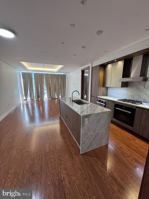 Welcome to the Four Seasons Private Residences in the heart of Harbor East, where luxury, location, and lifestyle converge.  From the 25th floor, this gorgeous 1 bedroom, 1.5-bathroom residence offers spectacular  views of the Inner Harbor and marina and the Baltimore city skyline through  floor-to-ceiling windows.  This refined residence features rich cherry flooring and high-end finishes throughout. The gourmet kitchen is outfitted with elegant cabinetry, a gas cooktop, wall oven, huge island with breakfast bar, and elegant quartz countertops. The adjacent dining area and wet bar with sink and wine fridge are ideal for entertaining or for a quiet night at home.  The primary suite includes a custom walk-in closet and a luxurious marble bathroom with double sinks, a large soaking tub, and separate shower. A second room, also nicely sized, offers comfort and privacy for guests or family.  As a resident, you’ll have exclusive access to the private 28th-floor amenity level featuring an indoor saltwater infinity pool, sauna, outdoor deck, fitness center, meeting rooms, and lounging areas — plus a dog-walking area for your furry family members.  You’ll also enjoy full access to all hotel amenities, including the outdoor pool and valet services. The Four Seasons features four on-site restaurants, and many amazing dining options just a short walk away in Harbor East and Fells Point.  Shopping, parks, harbor activities, museums, and miles scenic waterfront walkways are all close enough to enjoy every day.  Experience luxury living at the Four Seasons, it’s more than a residence, it’s a lifestyle.