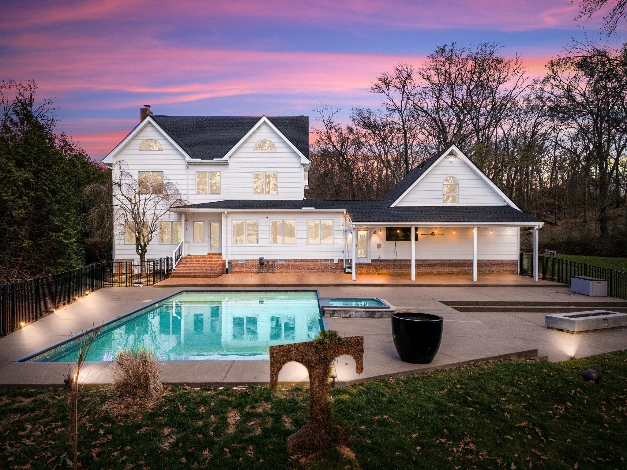 Experience exceptional Lakefront living on Old Hickory Lake in Mount Juliet in this stunning custom-built estate situated on a very rare & private 1.8-acre level lot with your own private boat dock & lift w/ electric & water, offering the perfect blend of luxury, privacy, and outdoor entertainment. This impressive home features 5 bedrooms, 5.5 baths, w/ a private office that could easily serve as a 6th bedroom, plus a spacious bonus/rec room above the garage space. Designed for both everyday living and entertaining, this home is filled with natural light, highlighted by a beautiful Florida room surrounded by windows and a covered upper-level deck ideal for enjoying the views of abundant wildlife. The newly added primary suite is a true retreat featuring California Closets, a luxurious spa-style bathroom, & private Miele coffee and drink center for ultimate convenience and comfort. BRAND NEW CUSTOM DESIGNED CHEF'S KITCHEN equipped with a premium Wolf appliance package, perfect for the culinary enthusiasts and entertaining guests. Step outside to an incredible outdoor living space featuring a heated in-ground saltwater pool with spillover spa, a large entertainment patio, and a custom concrete propane fire pit- all overlooking the expansive private grounds and lake. Additional upgrades and features include a brand new *new kitchen,*whole house generator, *tankless water heater, *new roof with leaf guard, *all new windows, *pool area,*new flooring and *fresh interior paint throughout, *electric vehicle charging station, *high end exterior home stereo system, *front and back fencing, *private dock w/ lift on Old Hickory Lake. Also- Bedroom option on main level if needed. This property offers rare privacy with expansive level land, incredible lake front access, and luxury upgrades throughout- creating the perfect setting for resort-style living just minutes from everyday conveniences. *Seller has additional adjoining lot for sale, over 2 additional acres, MLS 3133015.*