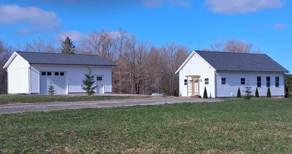 Magnificent home on 44.5 acres. Beautiful open and spacious kitchen/living room with expansive views of the landscape. Large and modern main bathroom. All rooms have 10ft walls, and all appliances purchased in 2025. Conditioned crawlspace. Central heat and AC. Second bedroom could also be used for storage or an office. 30x24 garage with 10ft walls, electricity, and concrete floor. A fantastic firepit area, and multiple trails in the wooded part of the property. John Deere X350 mower with less than 20 hours conveys with property. Additional acreage may be available.‚  Property has fast and reliable fiber internet.