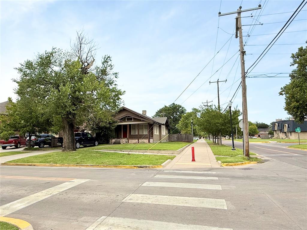 THIS LISTING IS BASED ON LOT VALUE ONLY. CORNER LOT on iconic Jenkins Ave, located within Center City Form-Based Code via the City of Norman, high density development area. Many many options for multi-family/multi-unit development. 6970 SF corner lot. No showings inside the house until a contract has been accepted, please do not disturb the tenants. Property leased until May 31, 2026. City of Norman has previously been open to adding up to 10 parking spots on the North side of the property along Duffy St.