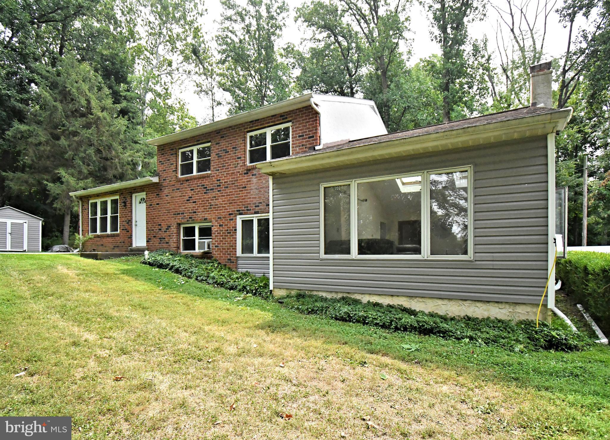 Here is a unique home in the heart of Chester County!   If you’ve been searching for a home that offers flexibility, space, and an unbeatable location, this is one you won’t want to miss.  Located in the highly desirable Downingtown Area School District, this beautifully updated 4-bedroom, 2 full-bath home offers a versatile floor plan designed to fit today’s lifestyle. Whether you’re looking for room to grow, space to work from home, or an opportunity to operate a small business, this property offers endless possibilities.  The main level features a spacious living room, an updated kitchen, and a dining area with sliding glass doors leading to the rear deck—perfect for morning coffee, outdoor dining, or relaxing while overlooking the open space behind the home. Upstairs, you’ll find three comfortable bedrooms and a full hall bath.The lower level provides even more living space with a large family room featuring soaring vaulted ceilings, creating a bright and inviting place to gather. This level also includes a fourth bedroom that can easily serve as a private home office or guest room, a second full bath, and a convenient laundry/utility room.Situated in West Pikeland Township, this property is located within the Village Preservation District 1, offering potential for professional or business use. If you work from home, need space for business vehicles, or are looking for a property with added flexibility, this is an opportunity worth exploring.With plenty of parking, open space views, and convenient access to major roadways, shopping, restaurants, and everyday amenities, this move-in-ready home truly offers the best of both comfort and convenience.Schedule your private showing today and discover all that 1551 Conestoga Road has to offer!