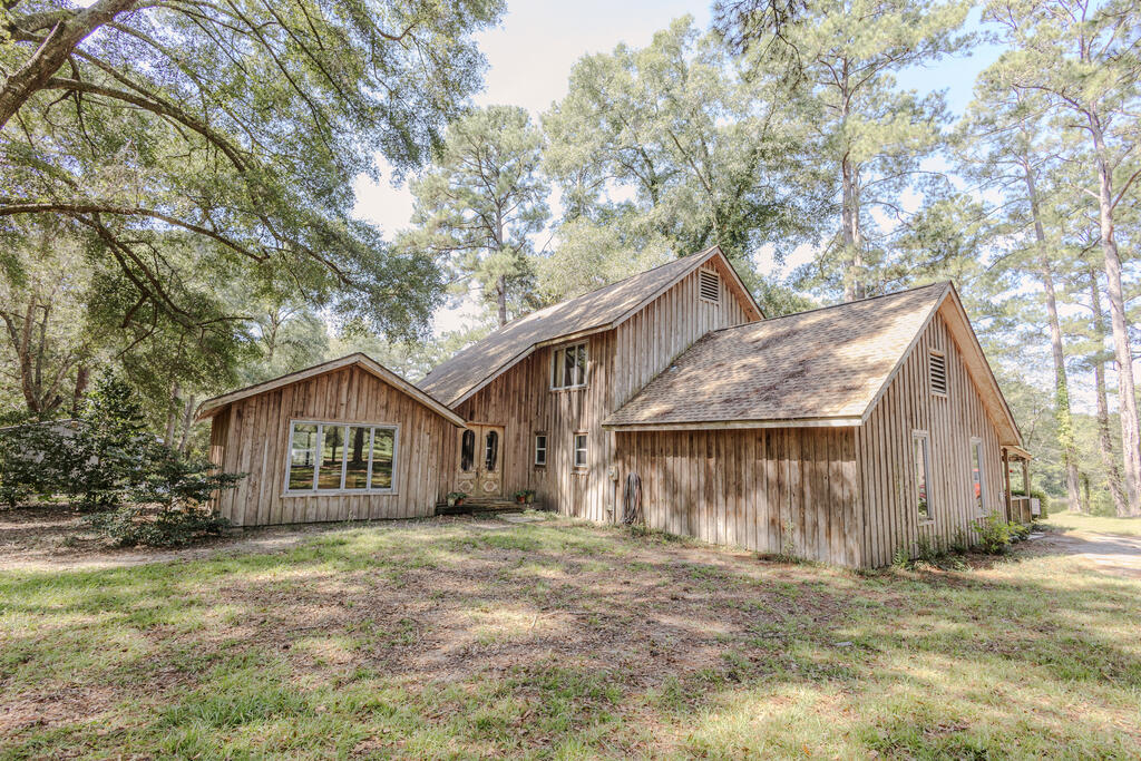 If peace and calm are what you are looking for, then this is it. This 52-acre estate has all you need to enjoy the outdoors. There's a good pond for fishing, and plenty of deer and turkey's if you like to hunt or just watch them. There is a large 3-bedroom rustic home, inground qunite pool and pool house, workshop and a 1312 square foot house that could be upgraded for a guest house or in-law suite.