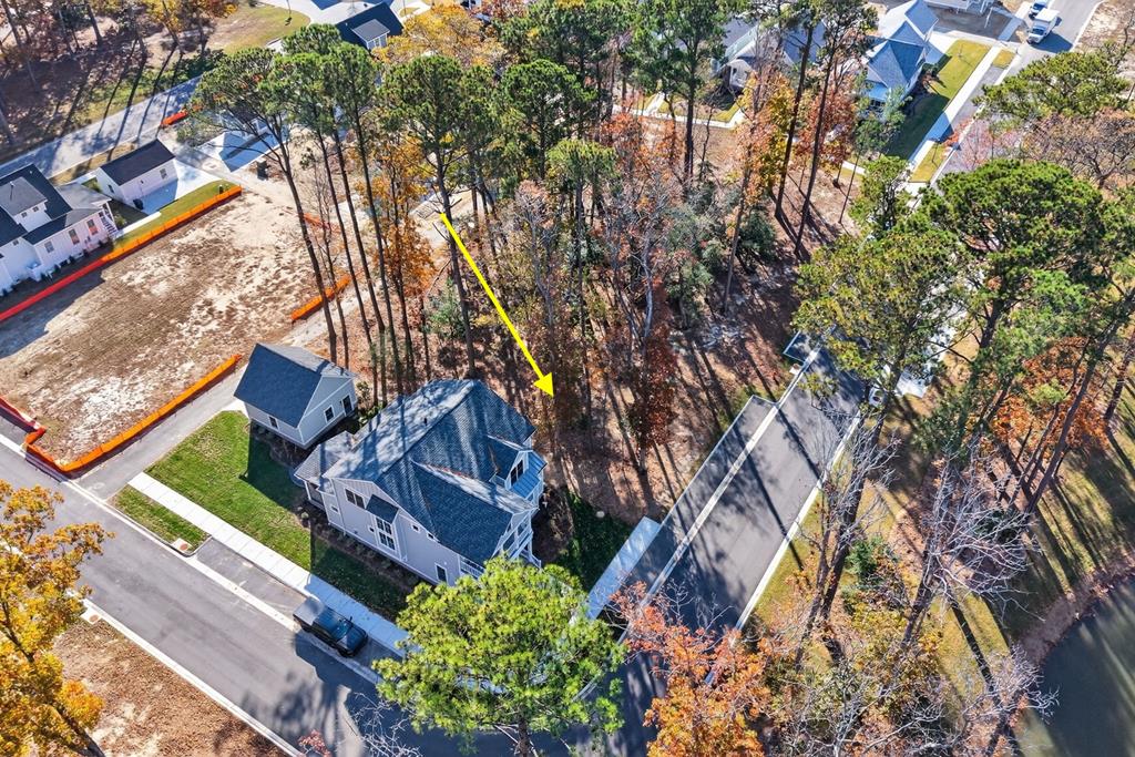 Discover the perfect setting for your custom coastal dream home on Lot 344 in the highly sought-after Bay Side Village II section of Bay Creek. Seller is offering 25K at closing towards Sports Membership! This exceptional homesite offers the ideal blend of natural beauty, and convenience—positioned among mature trees that provide both shade and character in a serene, and peaceful pond views! Located just a short distance from the Life Center, members enjoy easy access to world-class amenities including fitness facilities, pools, and community gathering spaces. Golf enthusiasts will love being moments away from the spectacular Bay Creek golf courses. Come and tour this homesite today!