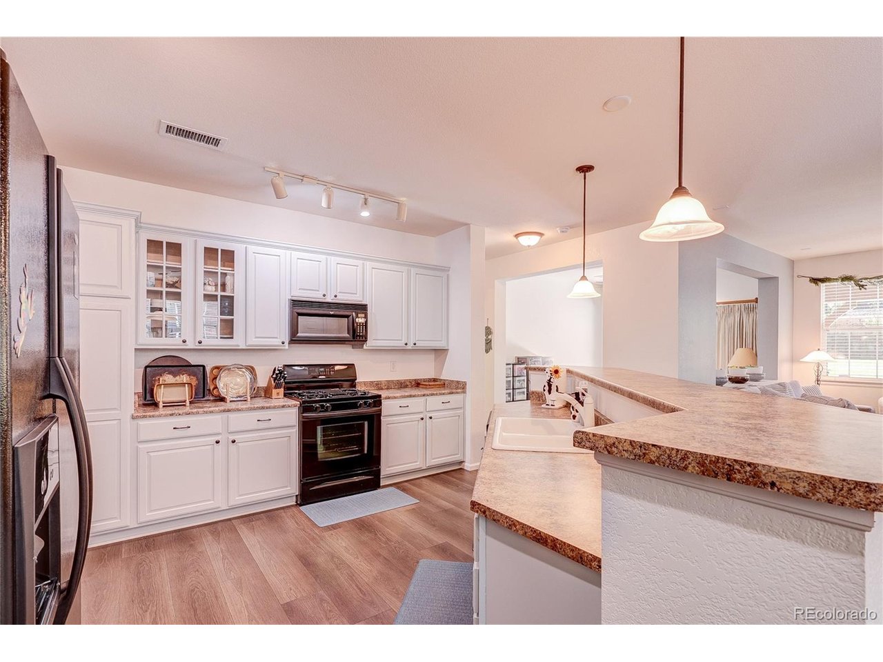 If you have been waiting for that single level home with ground level access in an interior location this home is for you. Perfect location two blocks from grocery, banking and shopping with a walking path just steps from the neighborhood park and walking trails very close by. Enjoy relaxing on your expansive back patio or have your coffee in the breakfast nook just off the spaicous kitchen featuring an over-sized angled center island with high top breakfast bar. The family room with gas log fireplace and generous sized dining room both have access to the back patio. The comfortable primary suite offers a deep soaking tub with separate enclosed shower, double vanity and an enviable walk-in closet. The second bedroom is just steps away from the full hallway bathroom and laundry closet. This is a great opportunity for those prospective residents seeking comfortable living all on one level. The finished attached two car garage is deep enough for most any sized vehicle or additional storage space. Be first to see this home and become Highland Walk's newest member!
