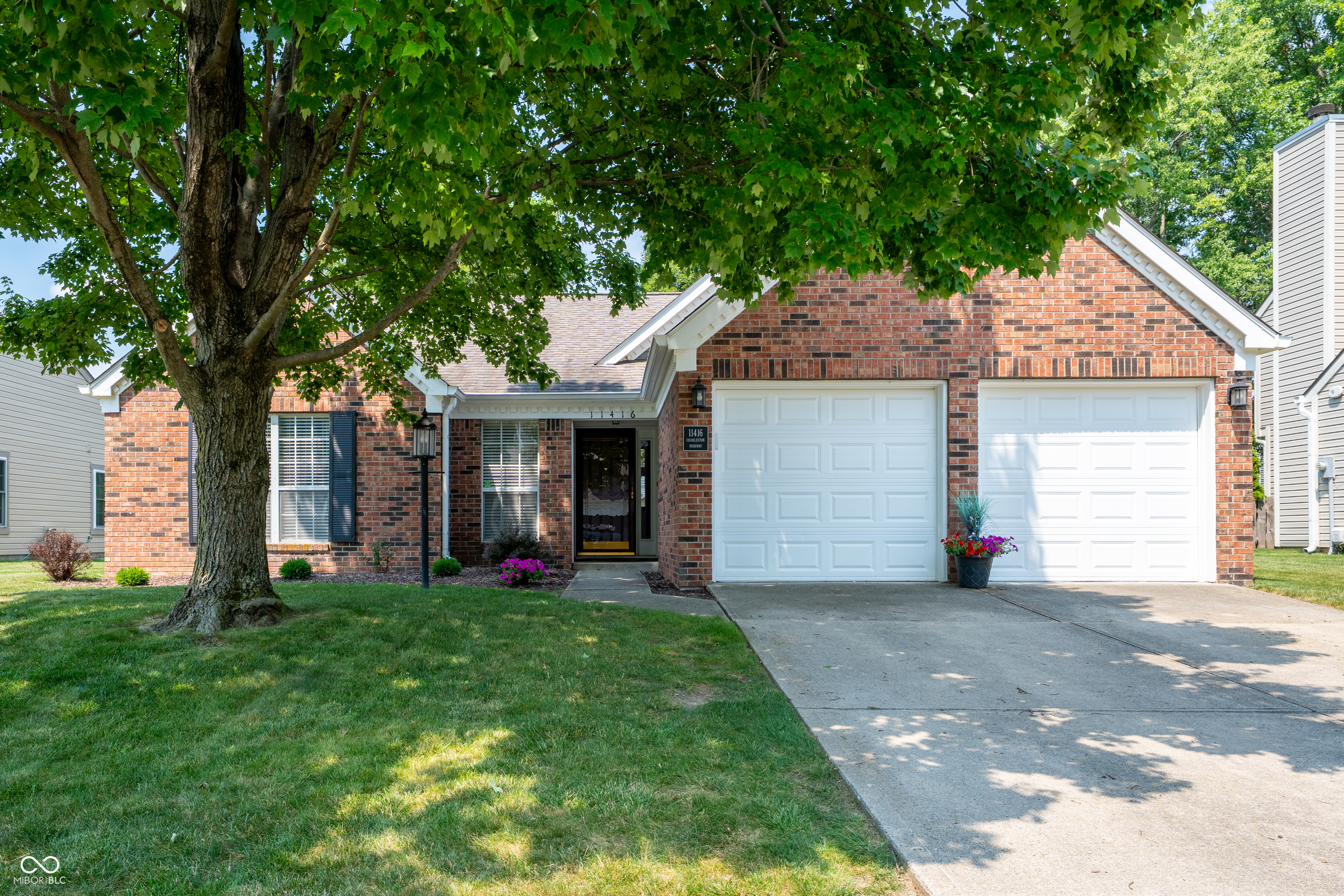 Welcome home to this beautifully maintained 3-bedroom, 2-bath ranch in the desirable Charleston Crossing neighborhood of Fishers! Offering 1,654 square feet of thoughtfully designed living space, this home features a bright, open floor plan with soaring cathedral ceilings, a spacious great room with a cozy wood-burning fireplace, and both formal dining and breakfast areas-perfect for everyday living and entertaining.    The kitchen offers ample cabinet and counter space, a breakfast bar, pantry, and all the essentials for preparing your favorite meals. The spacious primary suite features a walk-in closet and an en-suite bath with a garden tub and separate shower. Recent updates make this home move-in ready, including beautifully renovated bathrooms. The full guest bath has been updated, and the primary bath has been refreshed with new paint, fixtures, and a new shower, creating a clean, modern feel.    Step outside to enjoy the fully fenced backyard with mature trees, an open patio, and deck-ideal for relaxing, grilling, or entertaining guests. Additional highlights include a welcoming foyer, walk-in pantry, ceiling fans, attic storage with stair access, a 2-car attached garage, and a water softener.    Located in highly rated Hamilton Southeastern Schools and just minutes from shopping, dining, parks, and everything Fishers has to offer, this home combines comfort, convenience, and thoughtful updates in an unbeatable location. Don't miss your opportunity to make this charming ranch your next home!