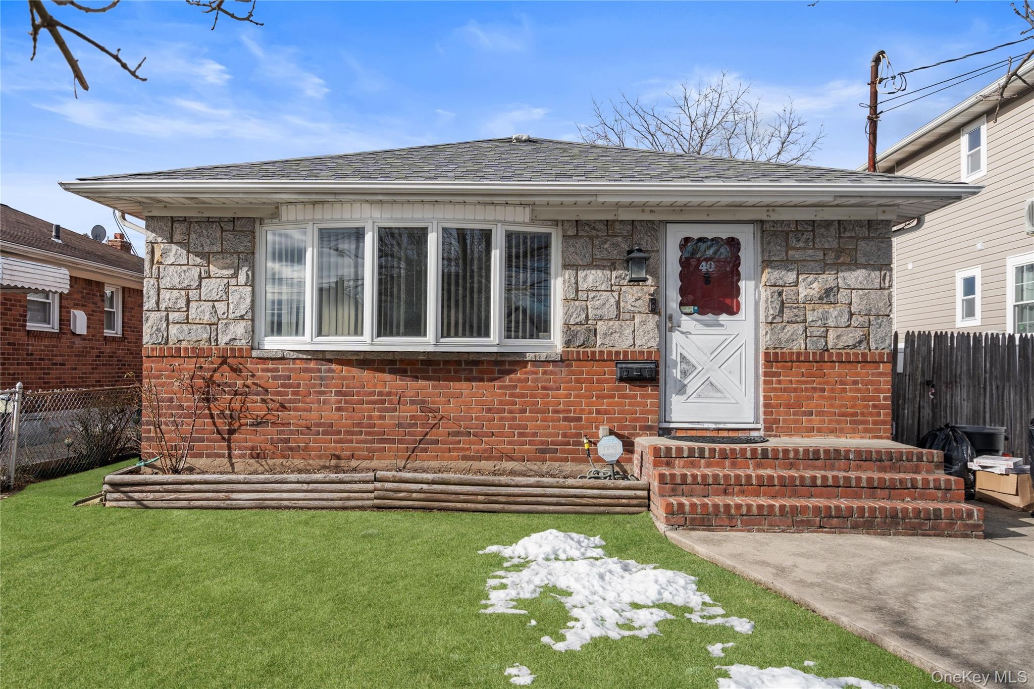 Nicely Maintained Ranch Home with 1,075 Square Feet and Convenient Location to Shopping, Transportation and Schools. Featuring Living Room, Formal Dining Room, Kitchen with Stainless Steel Appliances, 3 Bedrooms and Full Bath on Main Floor. Basement has Finished Living Area, Bedroom, Laundry Room and Storage Room. Hardwood Floors Throughout Main Floor. Central Air Conditioning, Oil Hot Water Baseboard Heat with 2 Zones. Rear Detached Garage on a Fully Fenced 40' x 101' Property.