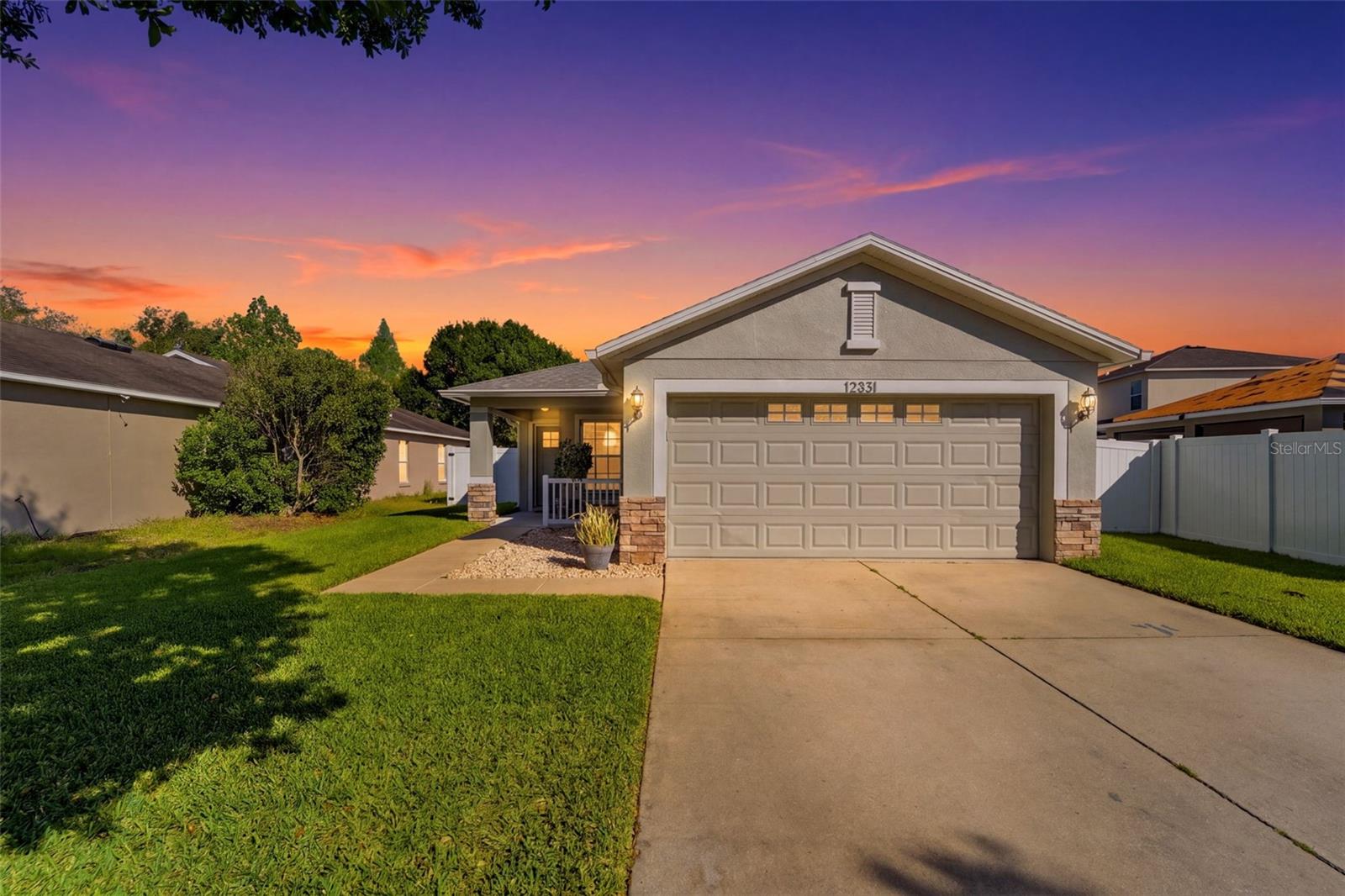 3-bedroom, two-bath home with an office, a fully fenced backyard and peaceful pond views, conveniently located just minutes from the Suncoast Parkway. The layout offers flexibility for a home office or additional living space, featuring waterproof EVP flooring (2019) throughout.Major updates are complete, including a new roof (2023) and AC (2023), water heater (2022) plus a remodeled guest bathroom (2022) featuring a cast iron tub. The kitchen includes updated appliances (2021), with a newer refrigerator, washer, and dryer (2023).With low HOA fees and no CDD, this home offers both value and convenience in a location that makes commuting, shopping, and daily living easy.