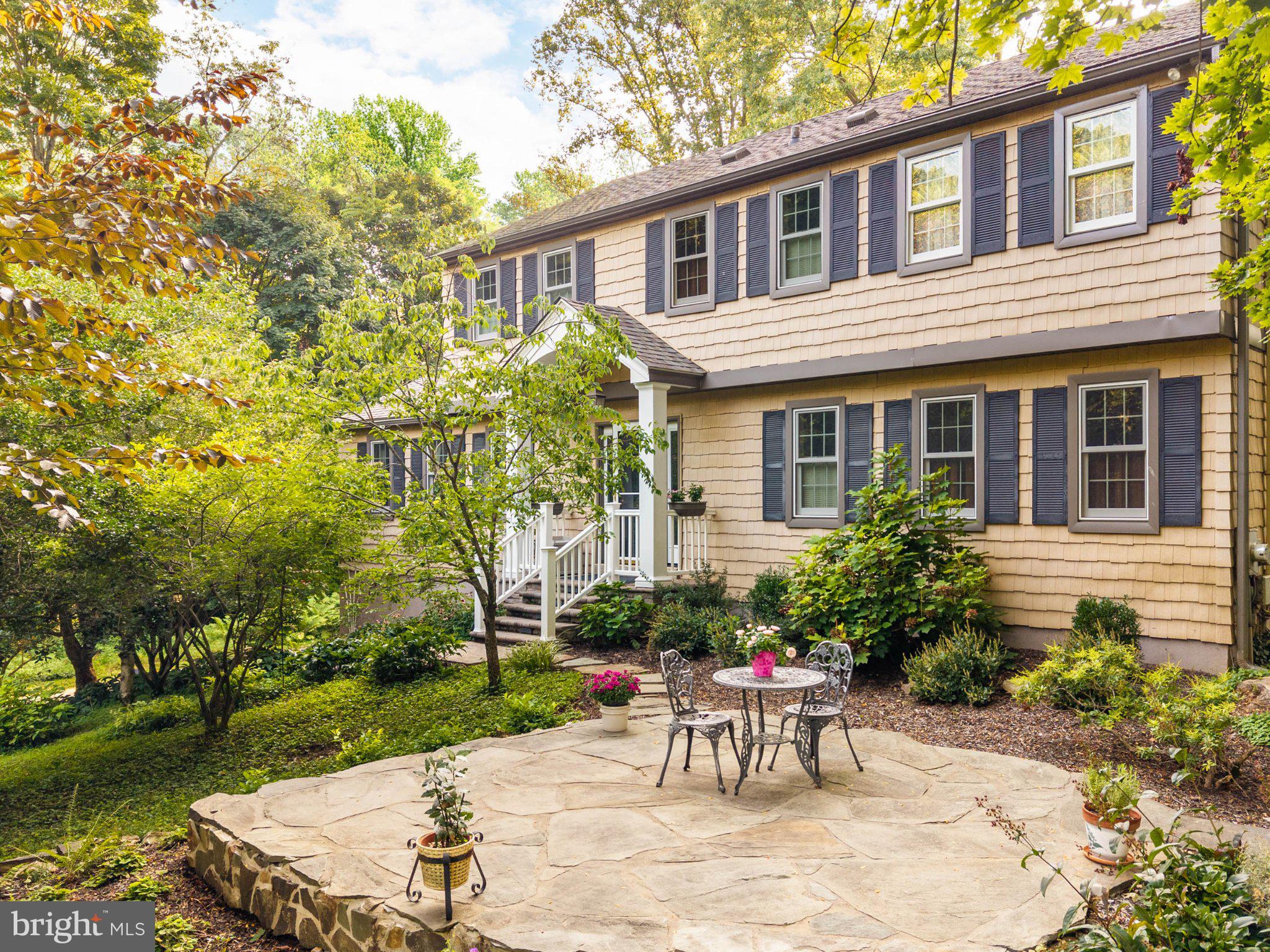 NOW AVAILABLE FOR SHOWINGS | Devon, PA | Tredyffrin-Easttown School DistrictA long driveway sets this home well-back from the road. Located on a 0.67 acre lot with mature plantings, this comfortable, well-cared for home is steps away from the R-5 Devon commuter train station, in the sought-after Tredyffrin-Easttown School District.Aptly named “Devon West” for its proximity to the train, this solid home features four nicely-sized bedrooms, two and a half baths, and hardwood floors throughout main level living level and all upstairs bedrooms. The updated kitchen has plenty of counter space and windows overlooking the yard, keeping it bright and airy, with flow to the adjacent dining room and handsome living room.The generously proportioned family room has plenty of space for two seating areas, and features a wood-burning fireplace and sliders to an enclosed three-season porch, overlooking the backyard, and peaceful garden pond with waterfall. (Such a beautiful and relaxing sound!) Mature perennial beds keep things colorful throughout the seasons, and evergreens screen the yard nicely. There is even a conveniently located main floor laundry room/mudroom with entry from the back yard. There is an attached 2-car garage, and a large unfinished basement ready to finish if that is in your future plans.This home has been meticulously maintained, keeping costs and maintenance down after you move-in, including a newer roof (2019 CertainTeed Landmark Pro shingles); a 20KW generator with automatic transfer switch (2023); updated electrical; energy efficient, high-quality Marvin and Pella Architect Series replacement windows (with maintenance free exteriors); and low-maintenance CertainTeed “Cedar Impressions” siding. Out front, a custom portico was added with a paver walkway with low-voltage lighting.For more peace-of-mind, this home has pre-listing home inspections that will be shared with prospective buyers upon request. (Public water; septic serviced and inspected by Gray Brothers).