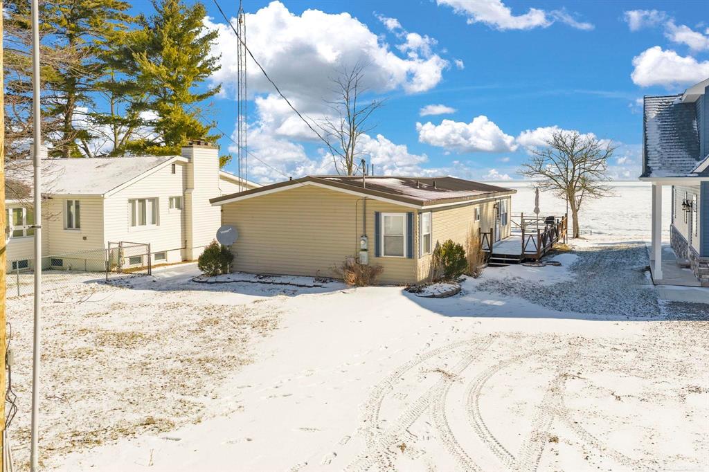 Enjoy living on Michigan's Sunrise Side along the sparkling shores of Lake Huron in this beautiful 3-bedroom, 2-bath lakefront home. With sweeping water views and the soothing rhythm of the waves, this property offers a lifestyle that feels both peaceful and invigorating. This home is conveniently located between the hallmark charm of Lexington and the bustling energy of Port Huron, giving you the best of both worlds: boutique shops, marinas, dining, festivals, and easy access to everyday amenities.  This home is ideal for anyone seeking a great investment or home that offers the serenity of waterfront living paired with the vibrant communities that define Michigan's eastern shoreline.