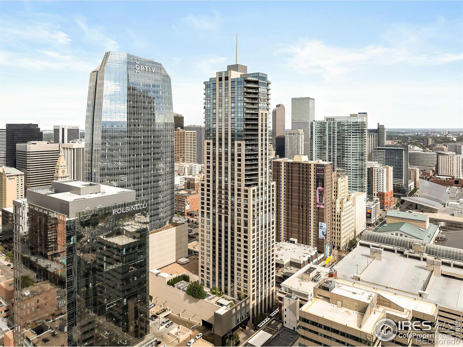 Sleek and stylish interiors await in this luxe escape poised within the Four Seasons Private Residences. A gracefully flowing floor plan flanked by a neutral color palette extends from an entry with built-in storage to an open and airy living area. Centered by built-in shelving, a modern fireplace grounds the space as natural light streams in through vast windows. Expansive sliding glass doors open to reveal seamless connectivity to a 373-square-foot balcony boasting city and mountain views. A dining area adjoins to a kitchen complete with granite and marble countertops, Sub-Zero appliances and a center island with seating. Enjoy ultimate relaxation in a spacious primary bedroom featuring balcony access and a spa-like bathroom with a soaking tub. A secondary bedroom presents potential for a home office or accommodation for guests. A private residential experience enhanced by iconic Four Seasons hospitality - concierge service, spa, elevated fitness center, pool, in-residence dining, housekeeping services and meticulously serviced common areas.