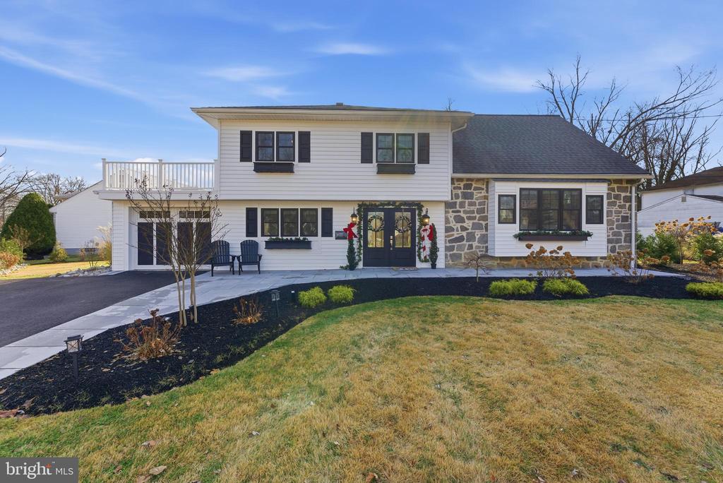 Open House Sunday December 14th 1-3 PM. I am thrilled to introduce you to a stunningly updated modern split-level home, perfectly situated on Winding Brook Drive in the desirable Chadwick neighborhood of Cinnaminson. As you approach the property, you'll be warmly greeted by a beautifully paved walkway leading to a bright and inviting foyer, boasting freshly painted walls and marble herringbone tile flooring that overlooks the great room and kitchen above.The entry level features a spacious den, which could easily be converted into a fifth bedroom or home office, accompanied by a convenient half bath and dedicated laundry space. This versatile area offers multiple possibilities, depending on your lifestyle needs, and could also serve as an in-law or au pair suite.The main floor is where the magic happens, with a beautifully designed kitchen that seamlessly flows into the great room. The kitchen boasts a generous island perfect for entertaining, quartz countertops, a stylish tile backsplash, Bosch cooktop, and dual wine refrigerators. The eat-in kitchen area seats five comfortably and provides ample natural light through the large window seating area. Neutral luxury vinyl plank flooring throughout the home ensures easy maintenance and personal decorating.Step outside, and you'll find a expansive solid surface patio, perfect for outdoor entertaining and relaxation. The third of an acre property offers ample space for a future pool or play area. Back inside, the third level features three spacious bedrooms and a modern full hall bath with stylish tile appointments.The Master Bedroom is the serene primary suite, complete with dual closets, a full bathroom featuring a beautifully tiled shower, and a private rooftop patio accessed directly from the bedroom. Imagine sipping your morning coffee or enjoying an evening cocktail while taking in the tranquil views of the tree-lined street.Additional features include a beautiful bedroom or game room on the fourth floor, complete with shiplap ceiling and accent beams, and a bright and airy basement with tiled flooring. The home's exterior boasts a newer roof, new siding, and windows, all showcasing modern accents in traditional white and black.With a 2019 HVAC system, new on-demand hot water system, and new electrical panel, you can enjoy cost-efficient utilities. Centrally located, this home provides easy access to local streets and is within walking distance to public elementary school, private swim club, and park. The fresh coat of paint throughout the home adds a bright and welcoming touch, making it truly move-in ready. All you need to do is bring your belongings and make this turnkey home yours.I invite you to experience the perfect blend of modern living and traditional charm in this established neighborhood. Schedule a viewing today and make this house your dream home