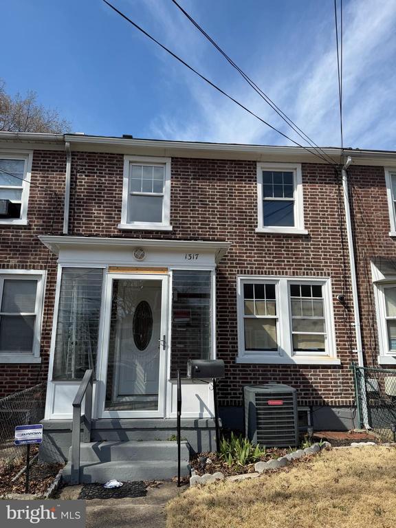 Looking for something different? This one has a finished basement! Located on a quiet street in the Fairview section, this townhome offers a modern flair. Upon entering the home, you step onto an enclosed porch that offers clear views of the street scene. The living room area showcases an elegant glass railing leading to the second floor with recess lighting and luxury vinyl flooring. To add to the modern interior, the lighting and flooring extend to the kitchen where granite counter tops and new stainless-steel appliances elevate the luxury experience. Just off the kitchen area, an elegant beverage center complete with more cabinetry and natural stone commands the attention in the dining room. Upstairs you are greeted with new carpets, bathroom, doors, and baseboards. Each bedroom is equipped with ceiling fans to help keep cool on those hot summers. The backyard has plenty of concrete flatwork and an extended overhang to maximize outdoor living space with plenty of courtyard parking. The home features 2 stage central AC, new electrical wiring, new electrical panel, and a new hot water tank. Come experience the modern lifestyle this home has to offer and much more.