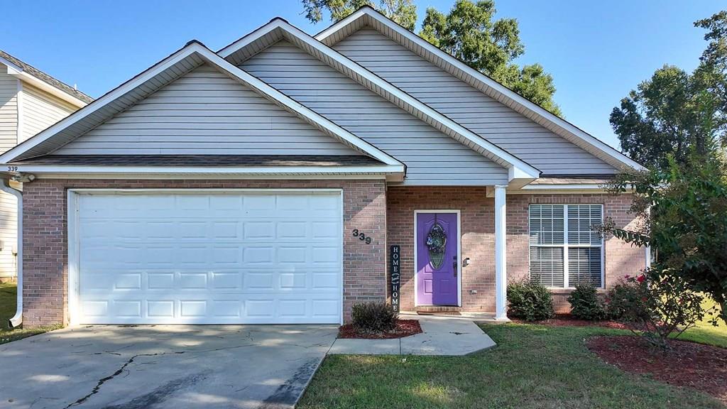 Pack your fishing poles! This stunning 3 bed/2 bath lake view home has a BRAND NEW ROOF and is located in Tall Timbers Village subdivision which is conveniently located just a couple of minutes from Publix and Lowes. The property is located centrally in town with shopping, restaurants, recreation, and schools all just a few minutes away! The spacious dining/living room is great for entertaining guests with ample room for getting lively during game nights or while watching a football game. The kitchen is the ideal space for cooking delicious meals for the family. At the back of the house, the screened-in porch offers a great place to relax and feel the breeze without worrying about bugs! Enjoy maintenance free living with the small yard, vinyl and brick exterior, and tile flooring.