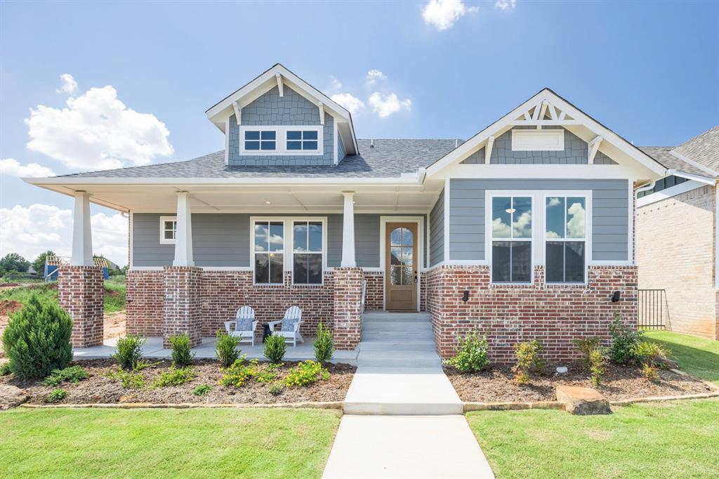 This charming Craftsman-style home is move-in ready and located in the final phase of The Plaza at Town Square—Edmond’s premier historically inspired community! Thoughtfully designed with 2 bedrooms, 2 full bathrooms, and a private study with built-in cabinetry, this home is perfect for anyone looking to right-size without compromising on quality or style. The open living space features a cozy corner brick fireplace and flows seamlessly into the kitchen, complete with Bosch appliances and plenty of prep space. Town Square is a historically inspired community offering a greenbelt with walking trails, a lake with a fishing dock, a clubhouse, a resort-style pool, a fitness center, a youth recreation center, a community garden and a playground. Don't miss your chance to own this exceptional home in such a vibrant and welcoming community! Come experience the timeless charm and easy living of Town Square! Model Home located at 3717 Union Park Place, open daily.