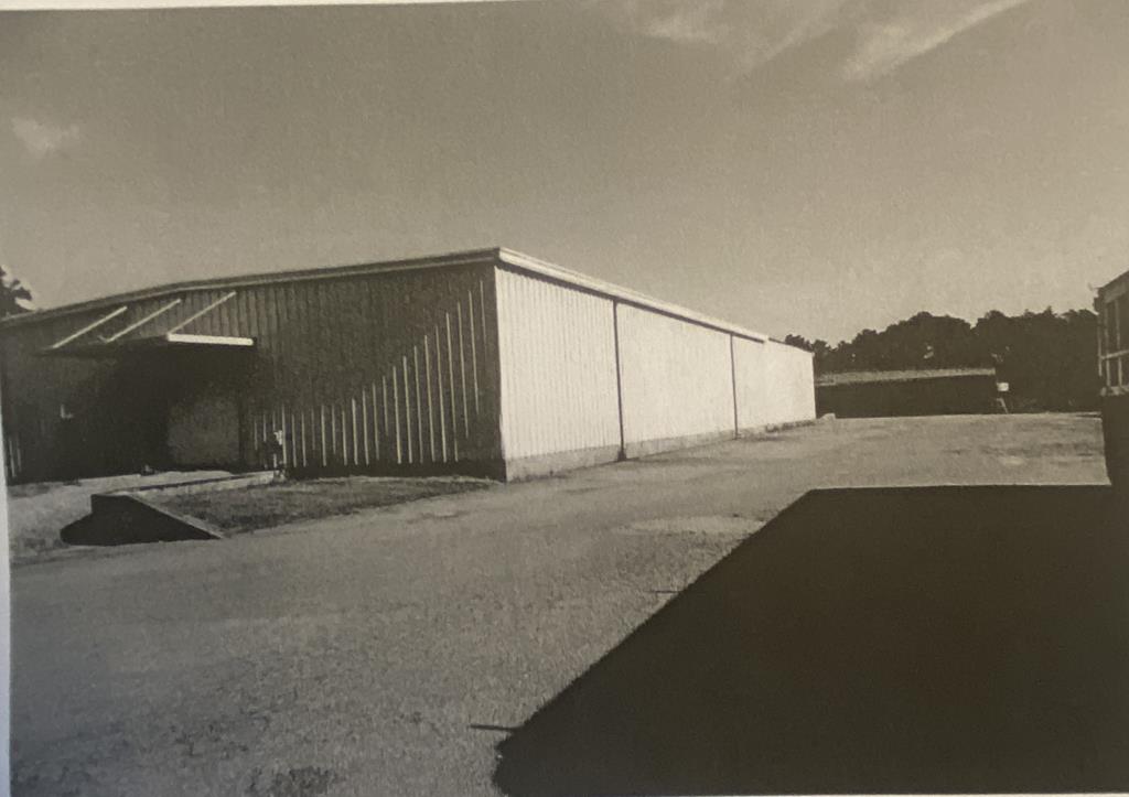This property is huge and has enormous potential.  It was a sewing factory in its beginning and became an agricultural facility for various uses.   It has tremendous storage for hay, cotton, or whatever one might need to store.  It can house huge equipment also.
