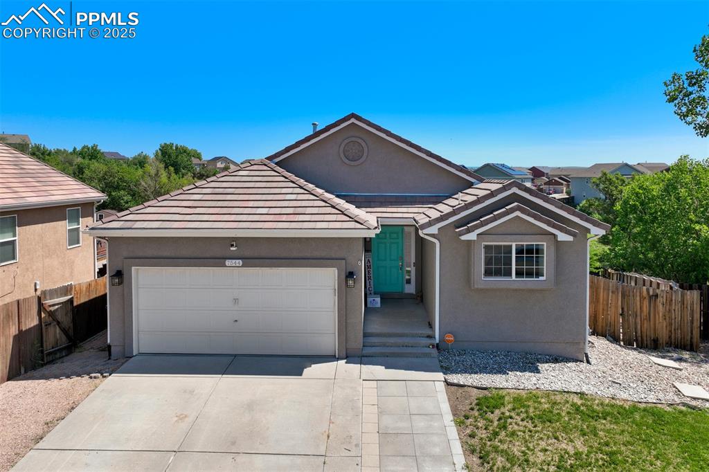 Don't Miss This One! Imagine Living in this Updated Stucco Beauty on a HUGE 1/4 Acre Lot Backing to Open Space! It's clean as a whistle and move-in ready... Situated on a quiet cul-de-sac with room to breathe! Love open designs? Well, this one's got it! The floorpan flows effortlessly from room to room, flooded with natural light and vaulted ceilings. The bright and beautiful kitchen is a cook's delight! It shines with new updates and stainless steel appliances. The adjacent formal dining area with elegant arches creates the perfect showplace for entertaining and gatherings, while the large living room offers plenty of room to stretch out or enjoy snuggling in front of the fireplace on those crisp Colorado nights. You can even walk out to the back deck to take in some fresh air and the wide-open spaces. The Master Bedroom Suite is more like a Private Oasis with it's generous 5-pieces bath, including a sleek freestanding shower and soaking tub... Not to mention the ample closet space. There are two more bedrooms upstairs, laundry area and another full bath. Now it's time to head downstairs where the Massive Family Room awaits! Just Imagine what you can do with this! There are also two more bedrooms and another full bath! This home is perfect if you're looking to spread out and everyone have their own space... both inside and out. There are no limits to how you can enjoy the giant backyard, especially with the open space behind you. So convenient to shopping and dining, and a super easy commute to Ft. Carson and quick access to I-25, Powers Blvd, and Marksheffel Road. Be sure and check out the 3D Matterport Virtual Tour and put this one on the top of your list!