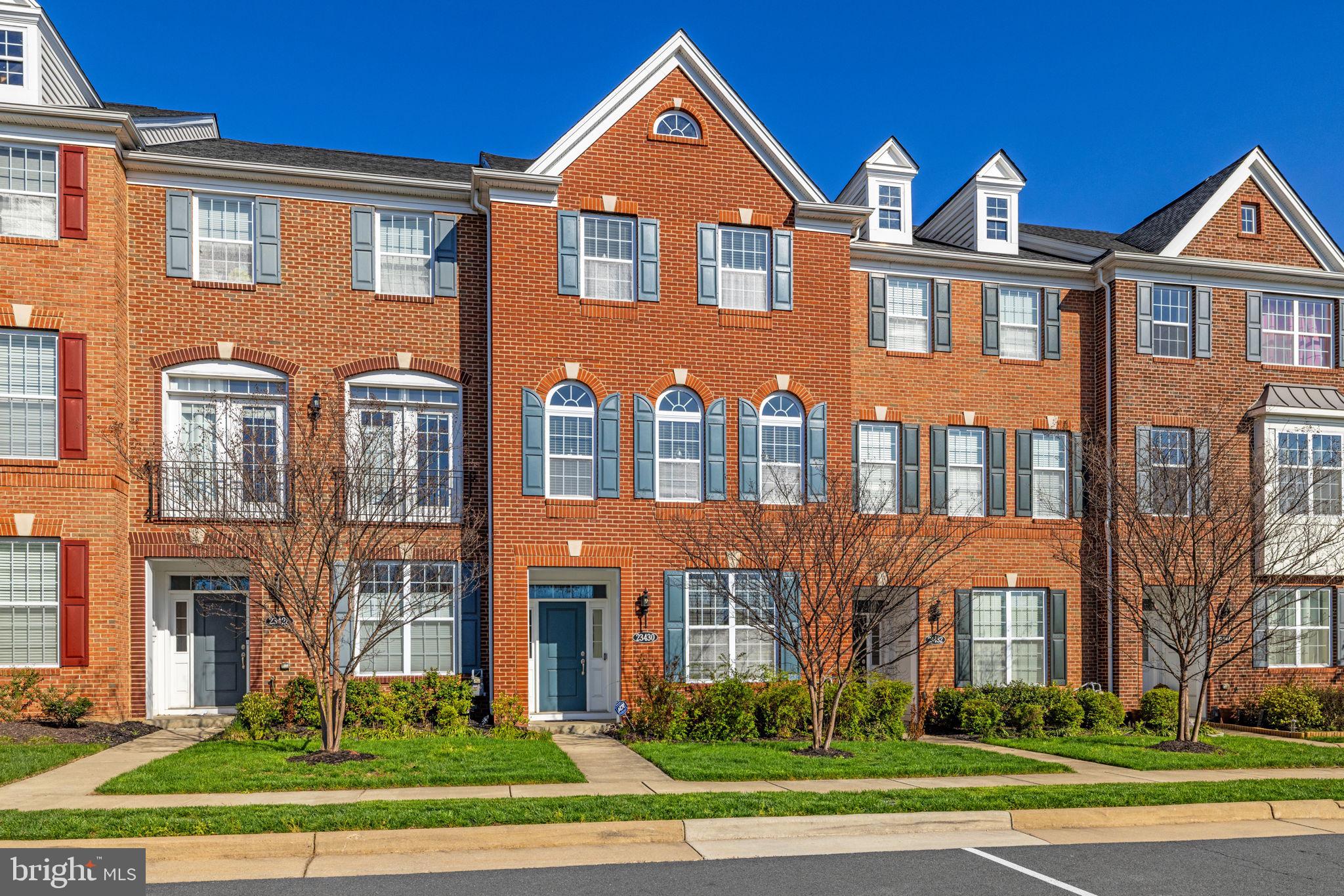 Welcome to 23430 Madison Heights Terrace, a beautifully maintained townhome in the highly desirable Loudoun Valley II community in Ashburn. Offering three finished levels of comfortable living space, this home combines modern style, thoughtful upgrades, and an exceptional location close to everyday conveniences.  The main level features a bright and open layout ideal for both daily living and entertaining. The kitchen showcases upgraded cabinetry, granite countertops, a stylish backsplash, and quality appliances, all flowing seamlessly into the dining and living areas. Step outside to the maintenance-free composite deck, perfect for relaxing or enjoying time outdoors.  Upstairs, the primary suite provides a comfortable retreat with an upgraded en-suite bath featuring a spacious vanity and a beautifully finished shower. Two additional bedrooms and a full hall bath complete the upper level, offering flexibility for guests, family members, or work-from-home needs.  The lower level includes a fourth bedroom and an additional full bathroom, making it ideal for guests, a home office, or a fitness space. This level also provides convenient interior access from the garage and entry foyer.  Residents of Loudoun Valley II enjoy access to community pools, fitness centers, playgrounds, walking trails, and outdoor courts. The home is conveniently located near shopping, dining, and entertainment at Brambleton Town Center and One Loudoun, with easy access to major commuter routes including VA-267 and the nearby Ashburn Metro Station. Both FiOS and Comcast internet services are available.  A wonderful opportunity to enjoy comfortable living in a vibrant Ashburn community with excellent amenities and commuter convenience. Schedule your tour today!