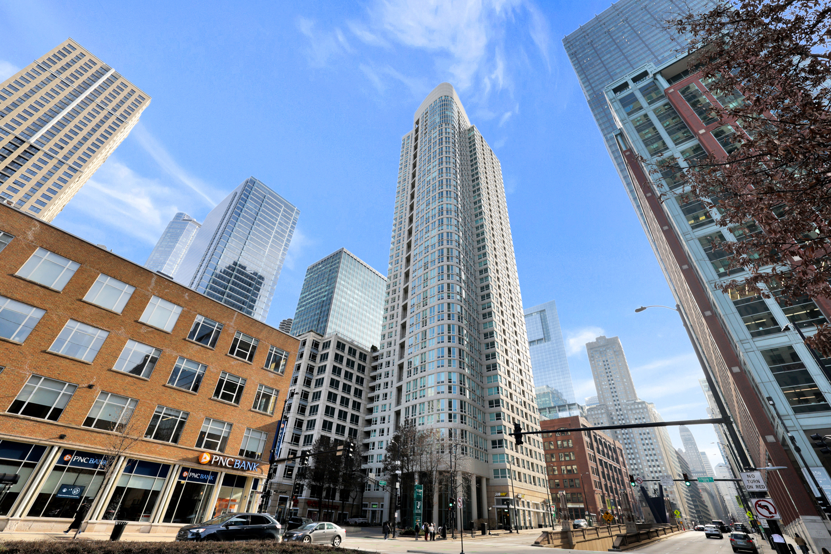 This Beautiful Condo is in the heart of amazing River North. It has a private balcony with a great view overlooking the city. The kitchen is updated with stainless steel appliances and custom cabinets with a granite countertop. Windows everywhere let in natural light and you have in unit washer and dryer. The building itself has everything you can want. 24 hour doorman, outdoor pool, an exercise room. There is even a tennis court and a sundeck. There is all the shopping and restaurants and even a dog park a short walk away.