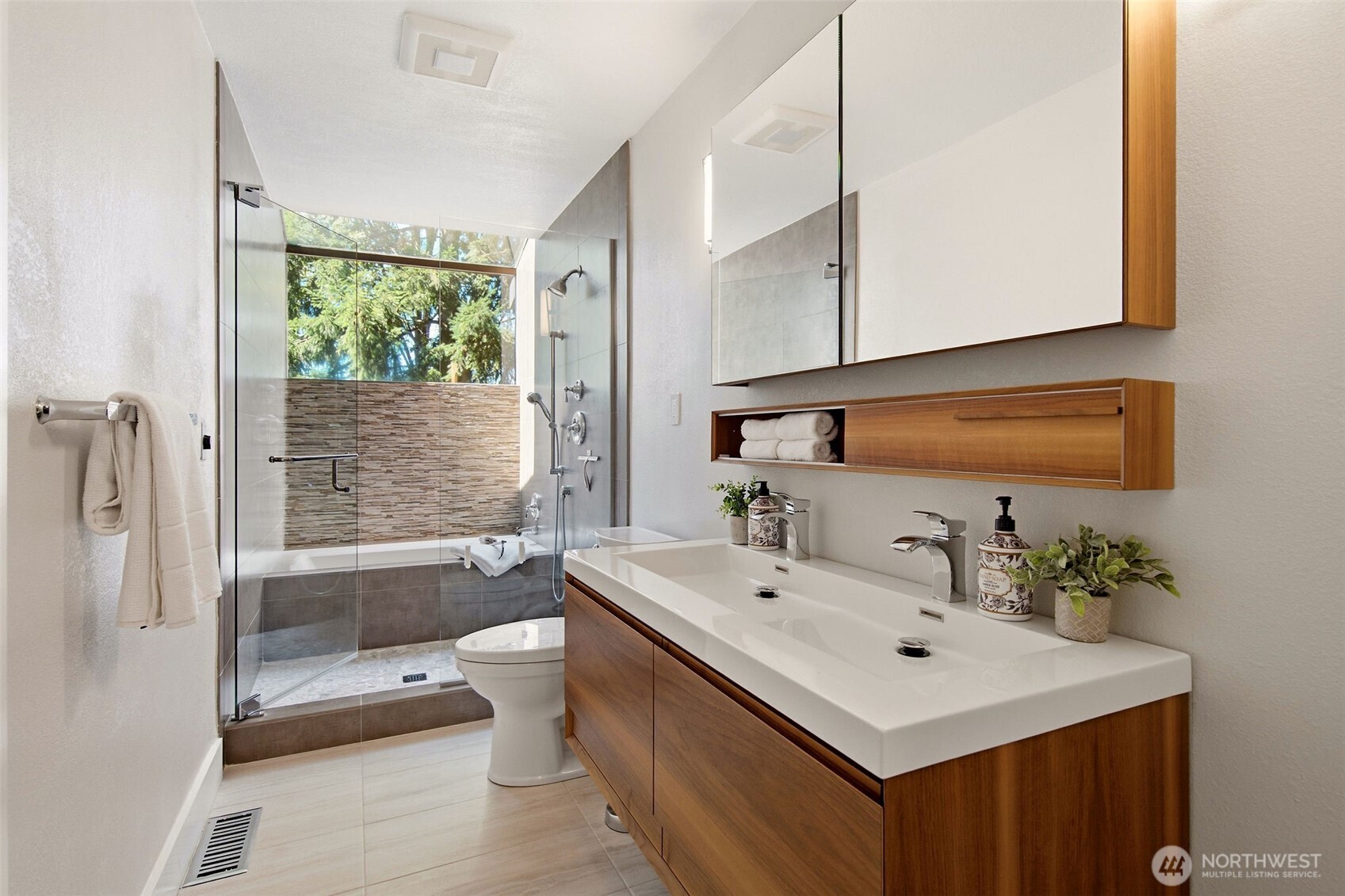 Double-sink vanity providing ample storage for daily convenience.