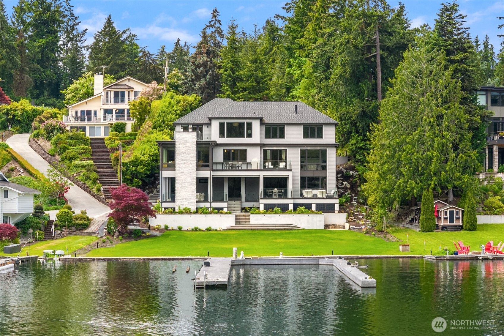 Wide, expansive views & 100 ft of waterfront at this newly completed, custom, street-to-water estate by Saad Custom Homes. Placed on a shy acre, this home offers the best of indoor/outdoor living with multiple entertaining areas & expansive lawn at the water’s edge. Private dock accommodates a 70+ ft yacht & additional watercraft. Inside, enjoy brand-new construction: the kitchen, dining & great room are the heart of the home providing thoughtful spaces for everyday living & festive gatherings. Guest suite & office on the main + 6 additional bedrooms including view primary w/spa-like bath. Ideal floor plan with rec room/bar, gym & sauna. Nothing is missing at this luxury estate in one of the most sought-after communities in the Northwest.
