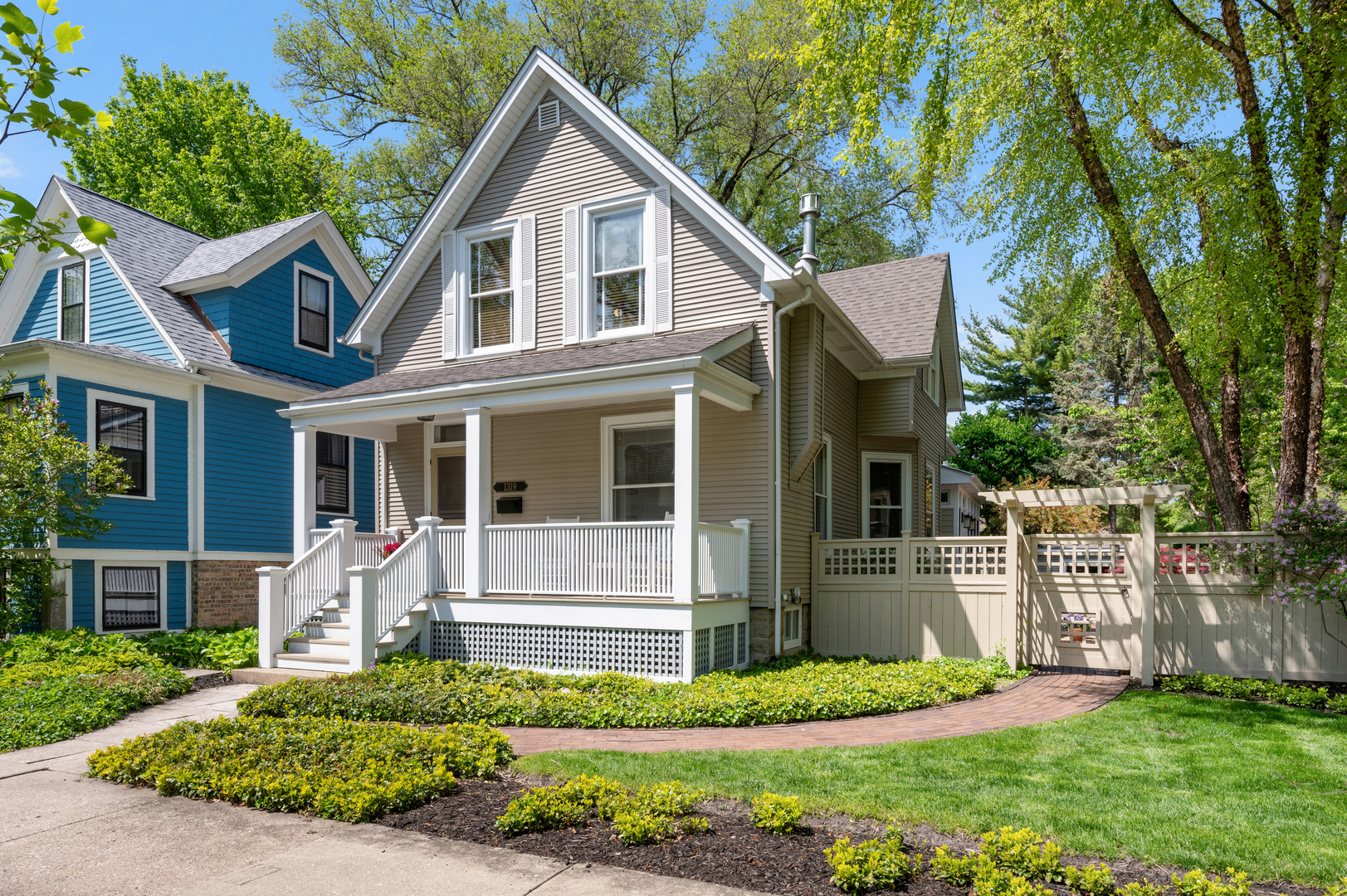 Located on a quiet street in Northeast Evanston within the sought-after Orrington School District, this well-maintained home offers generous living space, a functional floor plan, and opportunity to personalize. The second level features four bedrooms, including a primary suite with private bath, as well as an additional full hall bath. A 2003 addition expanded the kitchen and added the primary suite, while a 2013 rear addition introduced a four-season sun porch wrapped in windows, an expanded dining area, and mudroom. The professionally landscaped and hardscaped backyard is a true highlight, featuring a private putting green, basketball half court, and two-car garage. Numerous thoughtful updates and capital improvements have been completed throughout the years.