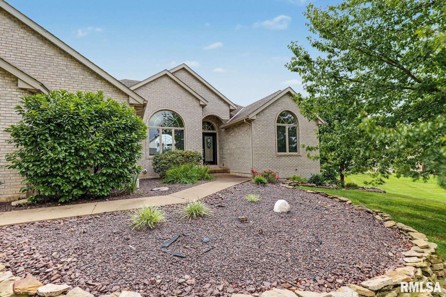 Stunning. Spacious. Serene. This exceptional five bedroom, 3.5 bath ranch offers lakefront living at its finest in Willow Creek, one of Quincy’s most coveted subdivisions. Set on a generous 0.69 acre lot, the home features more than 2,400 square feet on the main level plus another 1700 sq ft of finish in the daylight basement.   The dramatic formal living room showcases soaring 12 foot ceilings and floor-to-ceiling windows overlooking the lake. The main level also includes a spacious family room with a gas fireplace, formal dining room, and an inviting eat-in kitchen. You'll love the convenient main floor laundry and the luxurious primary suite is an oasis from the hustle and bustle of life. The finished daylight basement offers two additional bedrooms, a full bathroom, spacious recreation room with kitchenette, abundant storage, and flexible space for guests, hobbies, or multigenerational living. An attached four-car garage provides room for vehicles, boats, recreational equipment, and more.  Enjoy peaceful lake views from the covered deck, or step outside to your private swim platform/dock, perfect for swimming, paddle boarding, fishing, or relaxing by the water. With its expansive floor plan, private dock, beautiful lake views, generous acreage, and sought-after location, this is a rare opportunity to enjoy the best the Quincy has to offer. Priced to sell, so come see why this could be the home you’ve been waiting for!