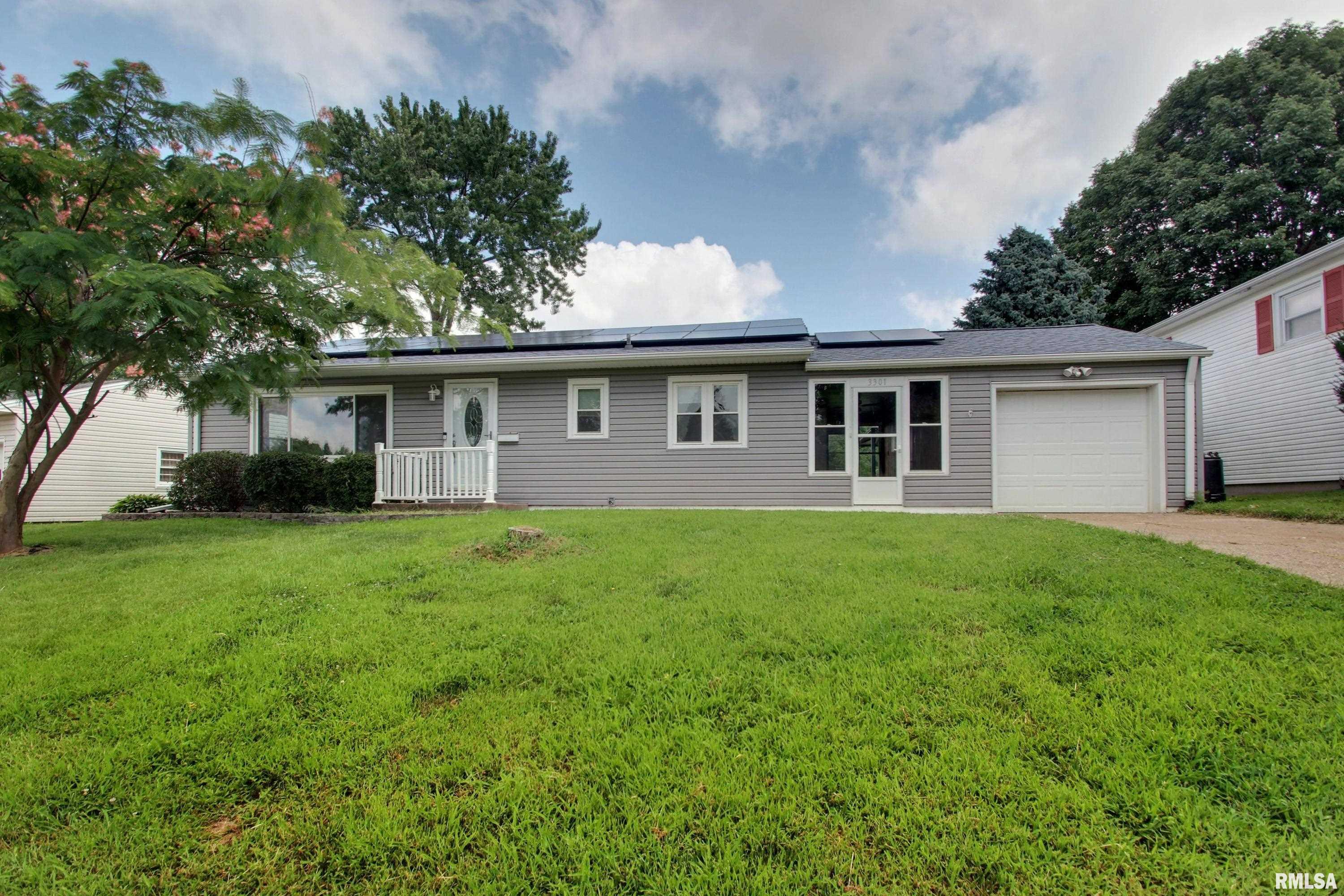 This is the ranch home everyone is looking for in a great central location!  Beautifully maintained with original hardwood flooring throughout most of the main floor this home is a beauty.  With three bedrooms and a full bath on the main floor, large living room and eat in kitchen this floor plan works hard.  The basement has a large finished space that could be used as a second living space and a large finished room with a working toilet, all you have to do is add a sink and you will have a half bath in the basement!  The garage is attached to the home with an 8x22 breezeway that would make a great three season room!  Solar panels have been a great addition to this home and the 12 month average Ameren bill is $80 for both gas and electric.  The home has vinyl replacement windows as well.  Call to schedule your showing today!