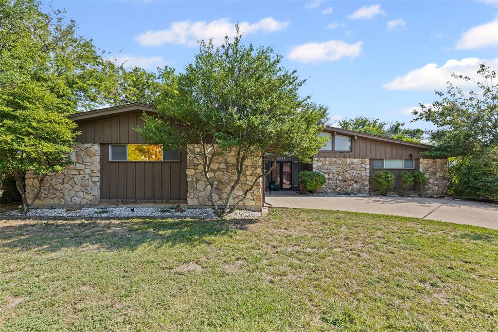 Discover timeless mid-century style with modern updates in this Wedgwood home. Featuring 3 bedrooms and 2 bathrooms, the property offers floor-to-ceiling windows, vaulted ceilings, a cozy fireplace, and new flooring throughout. The remodeled kitchen includes custom cabinetry and updated appliances, while the primary bath has been stylishly updated. Additional upgrades include a brand-new 200 amp service, whole-home surge protection, and a new hot water heater. The enclosed breezeway provides extra living space, and an oversized garage offers plenty of storage. Outside, the large backyard is ready to become your private retreat.