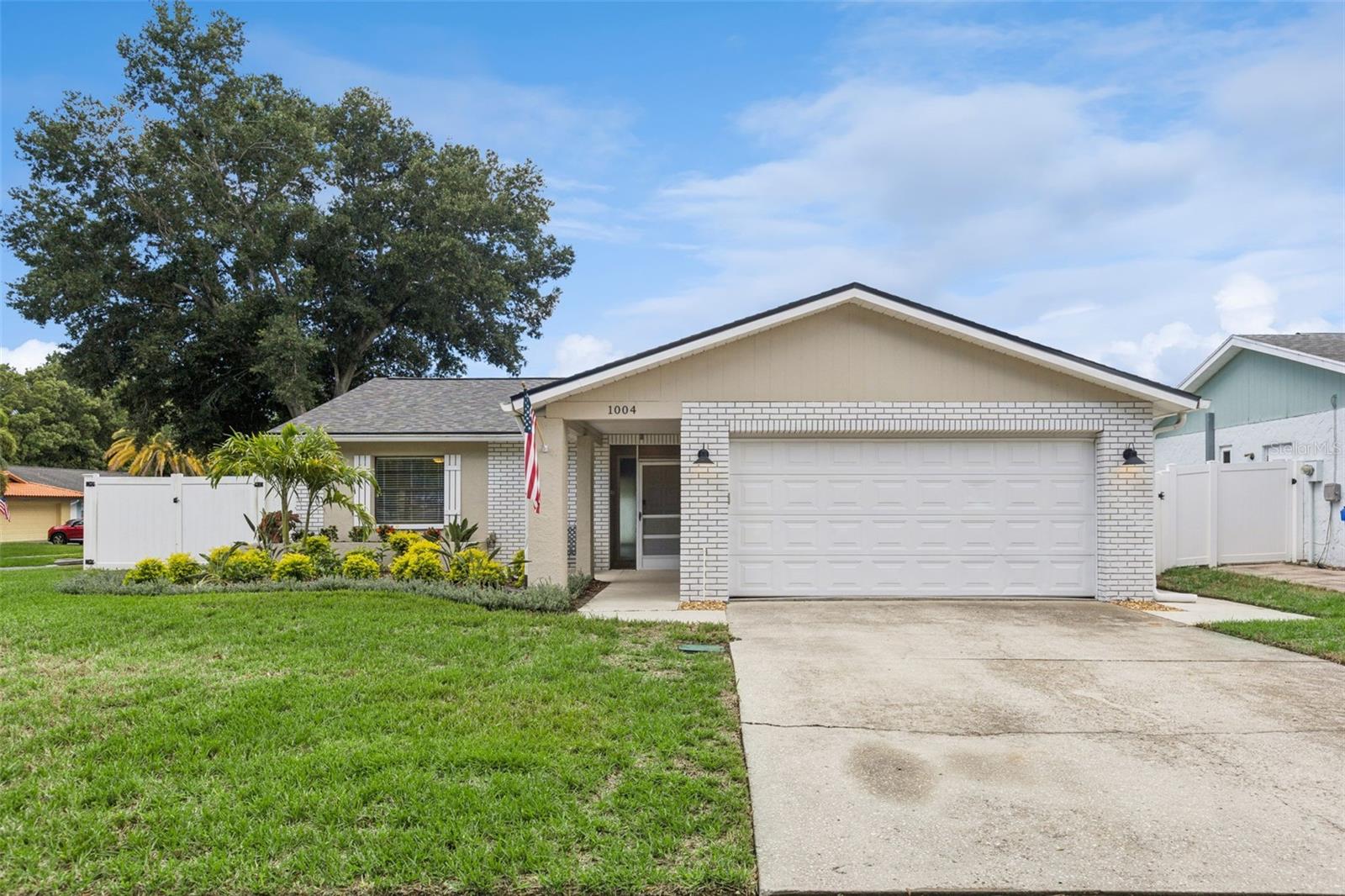 **This house comes with a REDUCED RATE through the seller's preferred lender. This is a lender-paid rate buydown that reduces the buyer's interest rate and monthly payment.**Welcome to 1004 Vineyard Court in Dunedin, a beautifully updated 2-bedroom, 2-bath pool home situated on a corner lot in a quiet cul-de-sac. Designed for easy Florida living, the home combines an open layout with inviting indoor spaces, a private backyard retreat, and several significant recent improvements. The property is a single-story home with an attached two-car garage.Inside, the open floor plan creates a natural flow between the main living, dining, and kitchen areas, making the space comfortable for both everyday living and entertaining. The living room features a wood-burning fireplace, adding warmth and character to the main gathering area. High and vaulted ceilings enhance the sense of space, while the primary suite offers a walk-in closet and a completely remodeled primary bathroom. The second bedroom and full bath provide additional space for guests, family, or a home office.Outdoor living is a highlight, beginning with a welcoming front porch and continuing into the private, vinyl-fenced backyard. A covered patio provides a shaded area for relaxing or dining outdoors, while the in-ground pool and surrounding deck create a dedicated space for swimming, lounging, and entertaining.The home also benefits from a substantial list of recent improvements, including the pool resurfaced with FibreTech in February 2024, a new pool pump installed in April 2024, HVAC equipment replaced in December 2024, HVAC ductwork replaced in December 2025, and a new roof installed in April 2026. Combined with the newly remodeled primary bathroom, these updates add meaningful improvements throughout the property.Located in Dunedin, the home offers convenient access to the area's shopping, dining, recreation, and outdoor destinations. Nearby amenities include Dunedin Plaza and Eagle Scout Park, while Downtown Dunedin and its restaurants, shops, and local attractions are also within easy reach. Previous listing information specifically highlights the home's convenient access to Downtown Dunedin. With its open living spaces, private pool setting, extensive recent improvements, and desirable Dunedin location, 1004 Vineyard Court offers a well-rounded combination of comfort, updates, and Florida lifestyle.