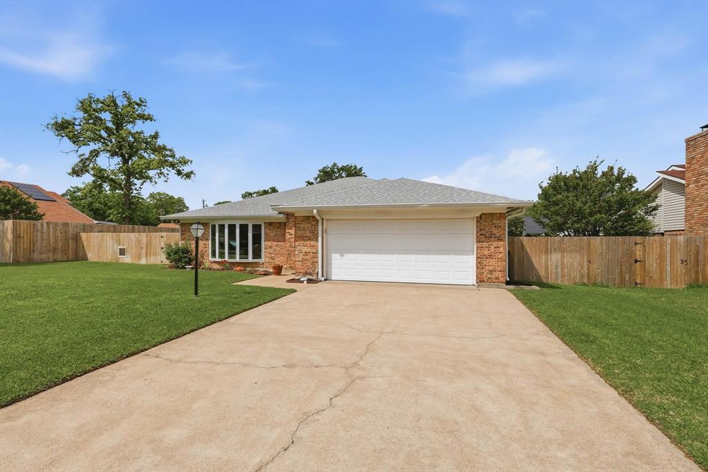 This exquisite, fully renovated home offers luxurious living within walking distance of Lake Grapevine. The kitchen is a showstopper, equipped with new quartz countertops, stainless steel appliances, custom cabinets, and an expansive island. The kitchen seamlessly connects to the living room, which features a cozy fireplace ideal for chilly evenings. Step outside to discover a fully climate-controlled workshop as well as a full shed for extra storage. Close to biking paths and walking trails, this home embodies all the elements that make this area of Grapevine so special and highly sought after.Professional photos coming 4-14